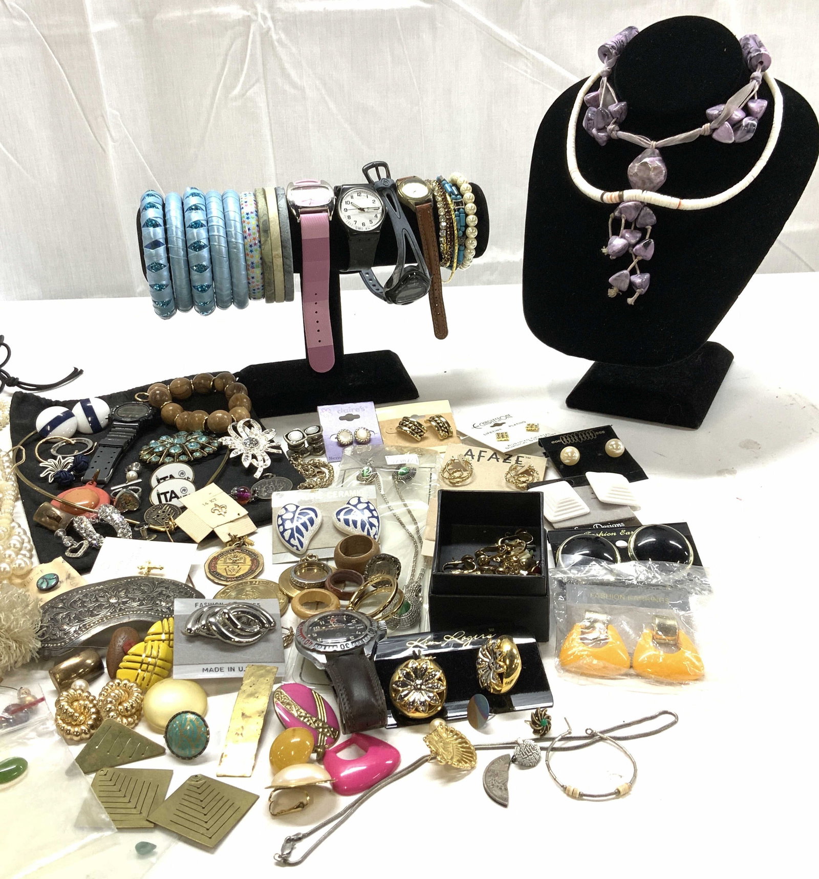 Costume, Sterling Jewelry Lot , Many NIP Jewelry: Large lot of vintage and new old stock costume jewelry, and pieces for up cycling jewelry or arts and crafts. Some singular items, some wood jewelry, many new on package jewelry. chunky clip and pierc