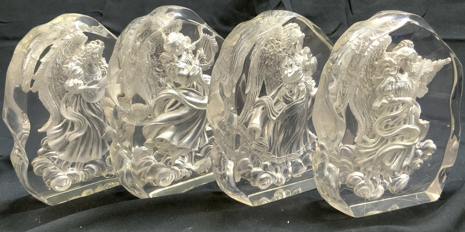 BRADEX Lot 4 Acrylic Angel Reliefs: Undersides of each read BRADEX. Includes Symphony of Peace, Symphony of Light, Symphony of Love & Symphony of Faith. Each relief is acrylic & depicts angels playing instruments. Each piece measures ap
