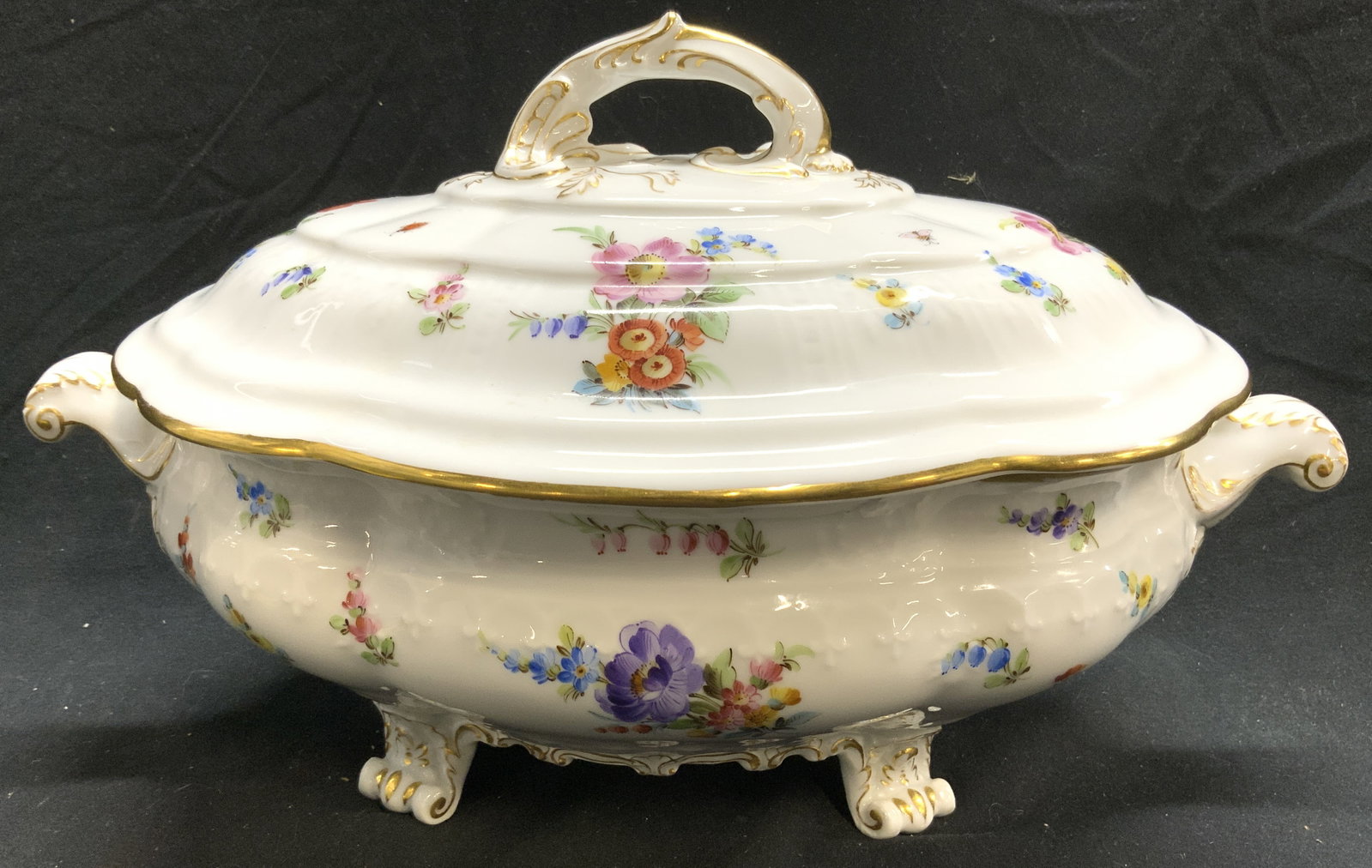 Trademarked Vntg Porc French Provincial Tureen: Underside is trademarked with green toned crossed double axe image. Tureen is vintage. Piece is French Provincial, scroll foot tureen with scrolled handles. Piece has gilt detailed areas. Tureen is wh