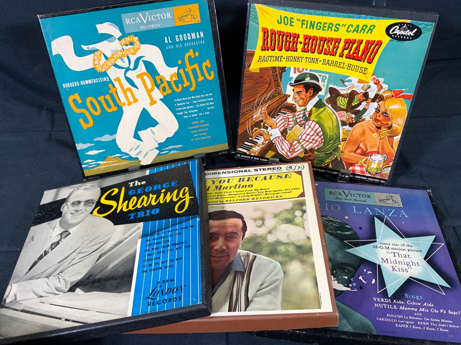 Vintage Jazz Phonograph Records & Stereo Tape.: Vintage phonograph records and one stereo tape. All boxes measures approx. 7.5 W x 7.5 H in. Joe Fingers Carr. Rough House Piano. Ragtime, Honky tonk, Barrel House. Produced by Capitol Records. 1940s