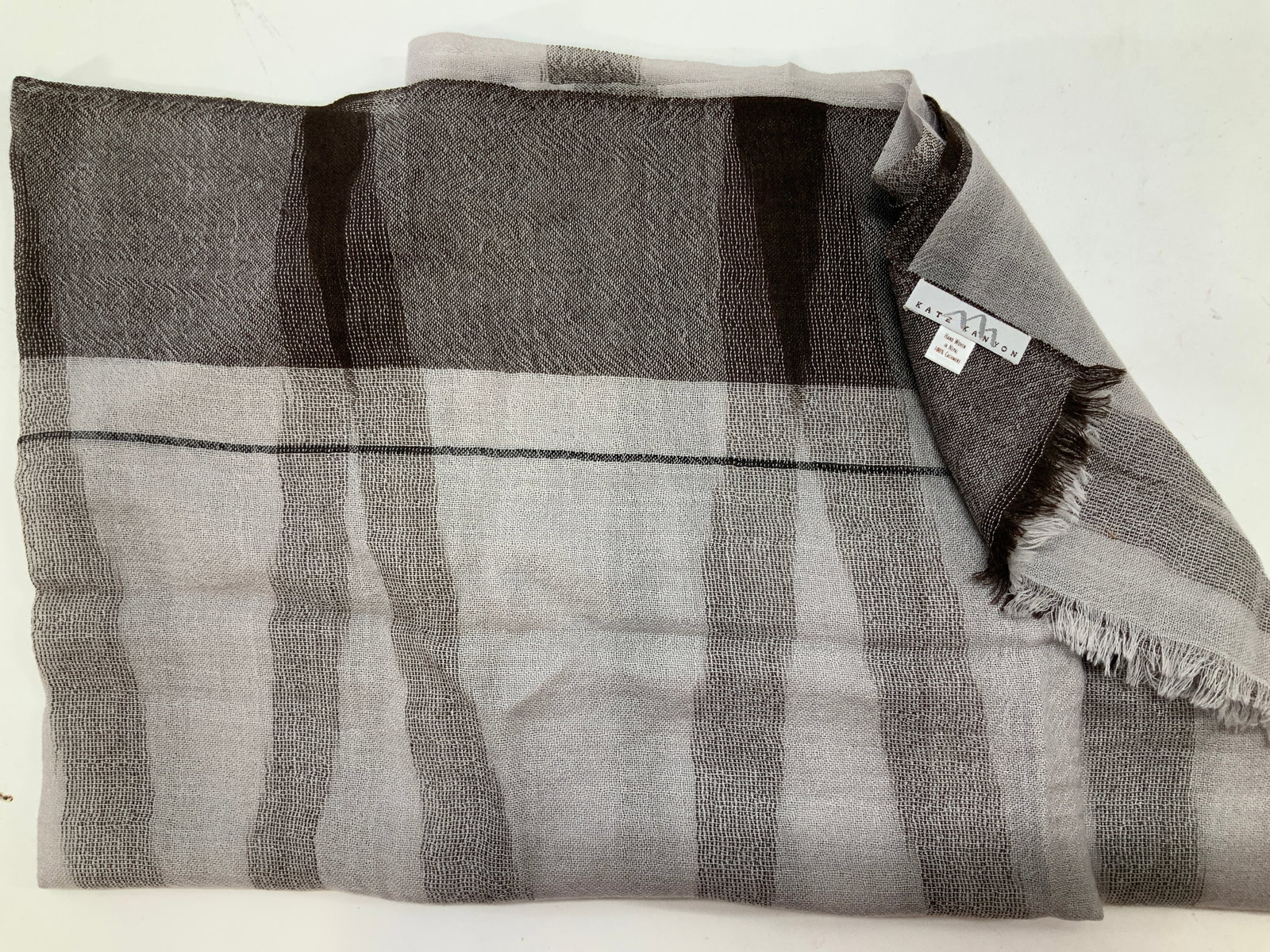 Kate Kanyon Hand Woven Cashmere Scarf, Nepal: Grey scarf/ wrap/ shawl. Gently worn 1x. Made in Nepal. Hand Woven Cashmere. Measures 23.25 in. W x 77 in. Long. Ladies wearables ,ladies accessories, vintage wear, estate wear, scarf, shawl, wrap, ca