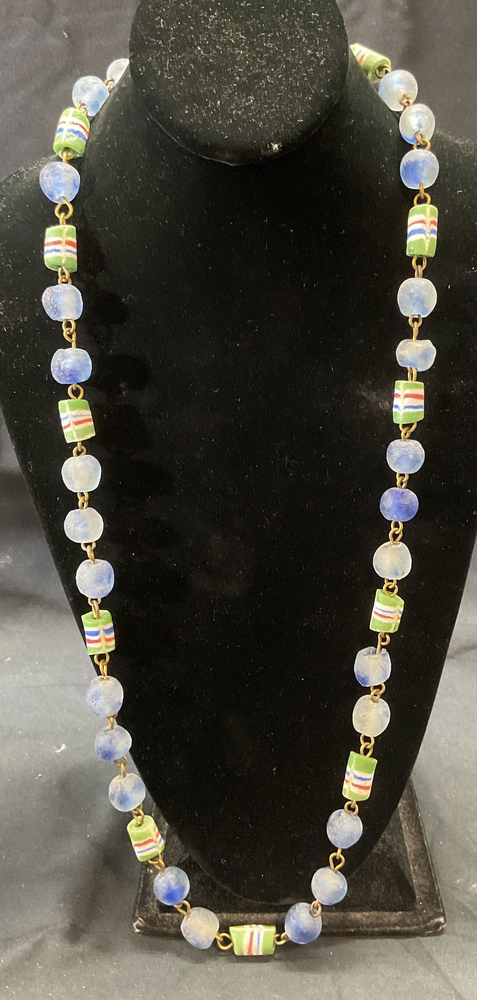 Vintage Blue & Green Art Glass Beaded Necklace: Vintage blue and green tone pad art glass beaded necklace. Drop length approx. 16 inches. Piece has weight. Some surface wear including scratching observed. Jewelry, estate jewelry, fashion jewelry, c