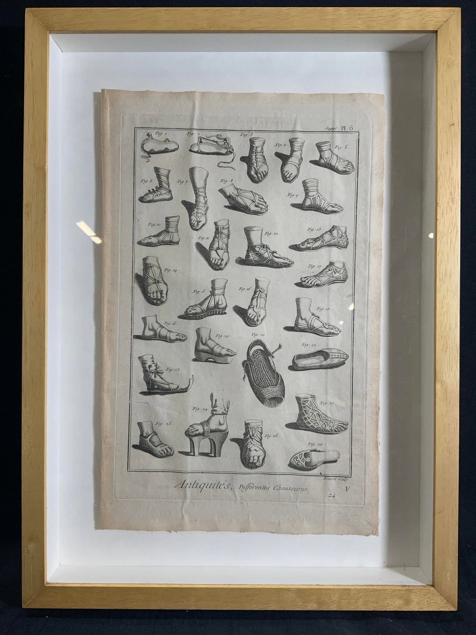 BERNARD DE MONTFAUCON Framed Antique Engraving: Engraving print on paper. Engraving by Benard De Montfaucon (1655-1741). Titled Differentes Chaussures or Different Shoes. Caption reads Antiquities, Differentes Chaussures , 24 , F Benard Sculp. Top 