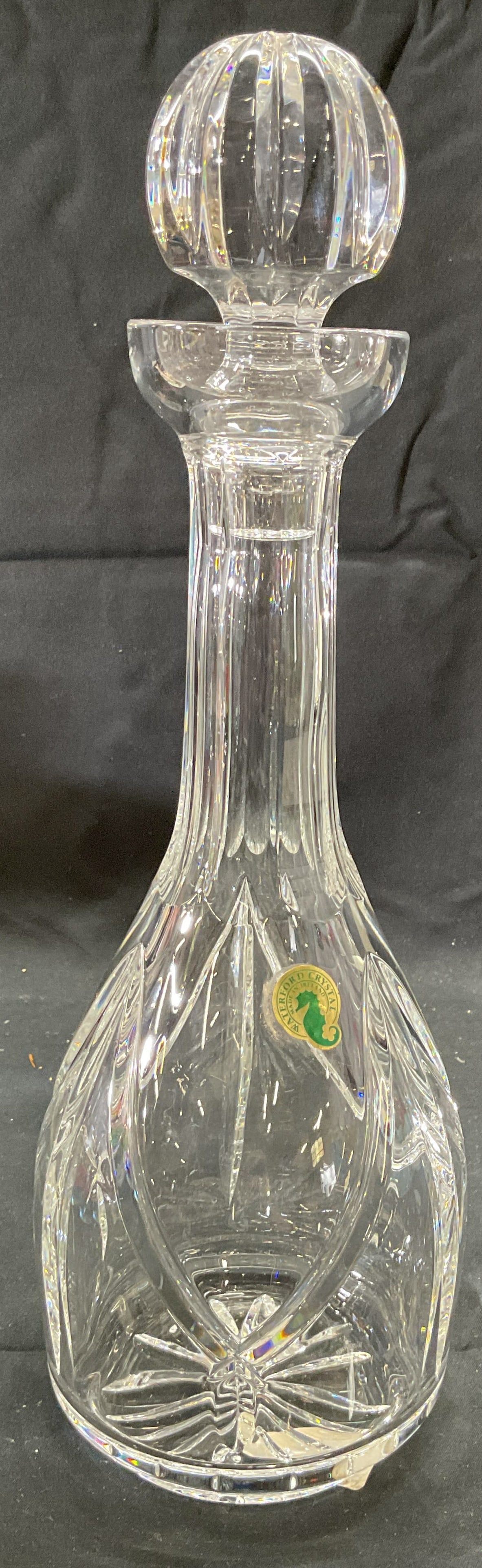 Waterford Crystal Glenveagh Decanter, Ireland: Waterford Crystal Glenveagh decanter. Raised geometric pattern. Signed on sticker and etched to underside. Measures approx. 4 x 11 inches excluding stopper. Like New condition. Waterford, Waterford Cr