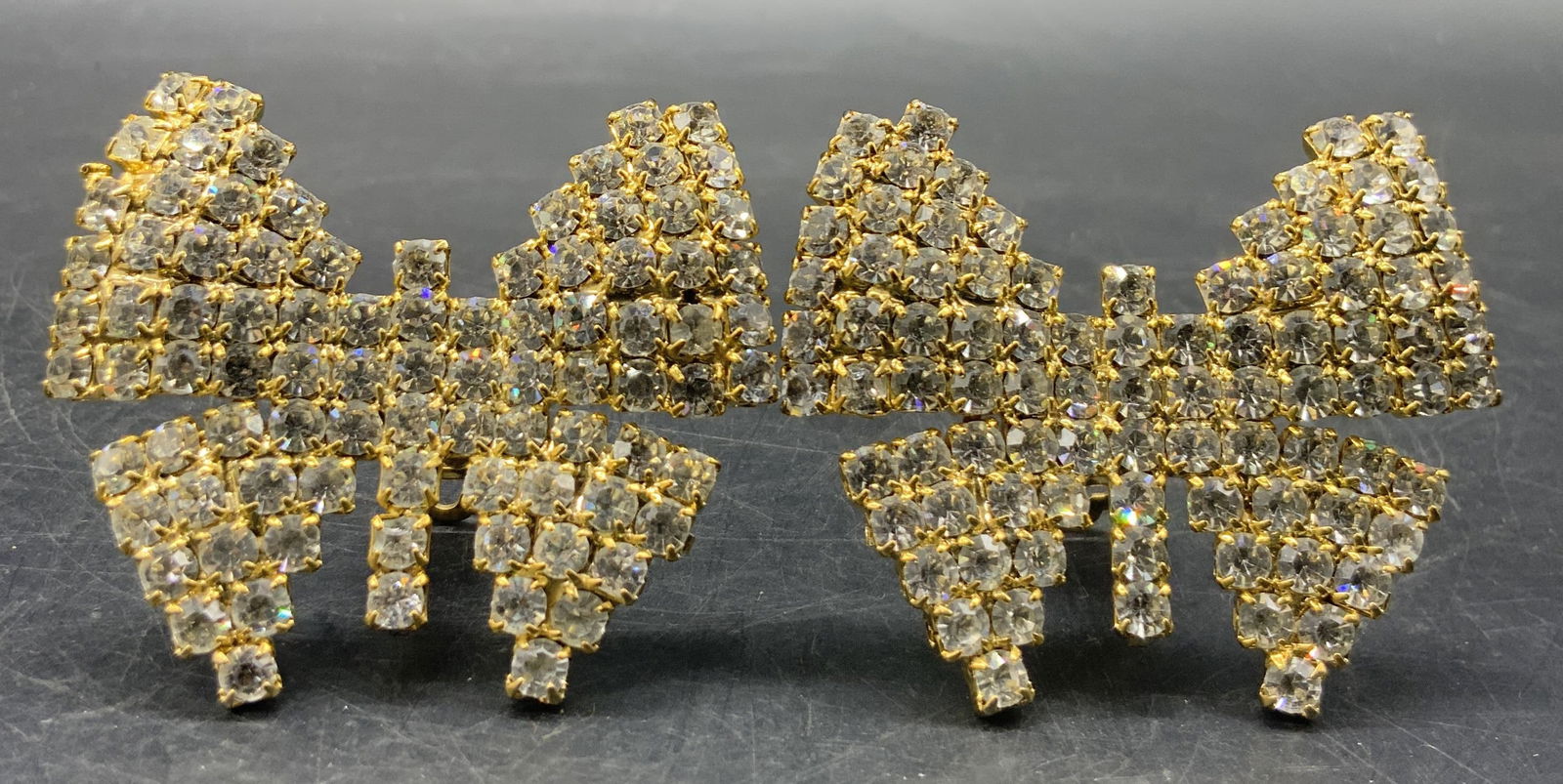 Vintage Bejeweled Butterfly Form Clip On Earrings: Vintage gold tone metal butterfly form earrings studded with faceted clear crystals. Measures approx. 2.25L x 2W in. Some wear consistent with age, use, and exposure. Vintage jewelry, Vintage accessor