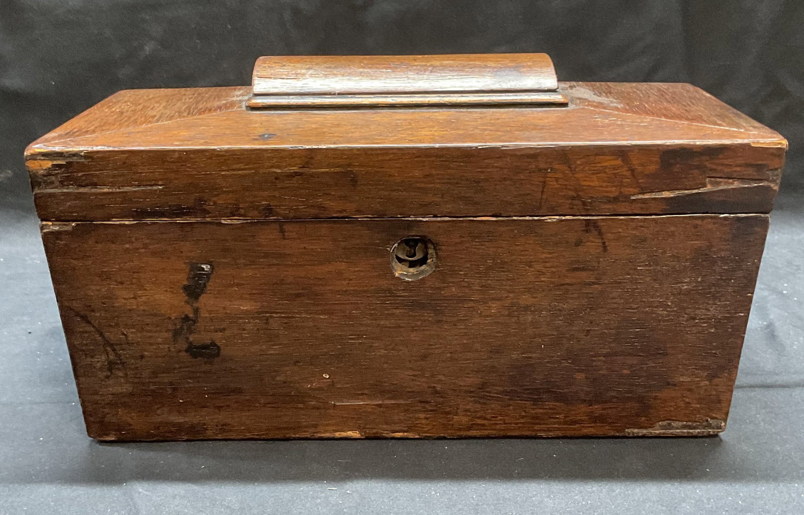 Antique Wooden Sarcophagus Tea Caddy: Antique wooden tea caddy, Sarcophagus shape. Tapered rectangular body, 3 compartments to interior. Removable round opening insert. Includes one lid. Measures approx. 11.5 x 5.5 x 6.5 inches. Does not 