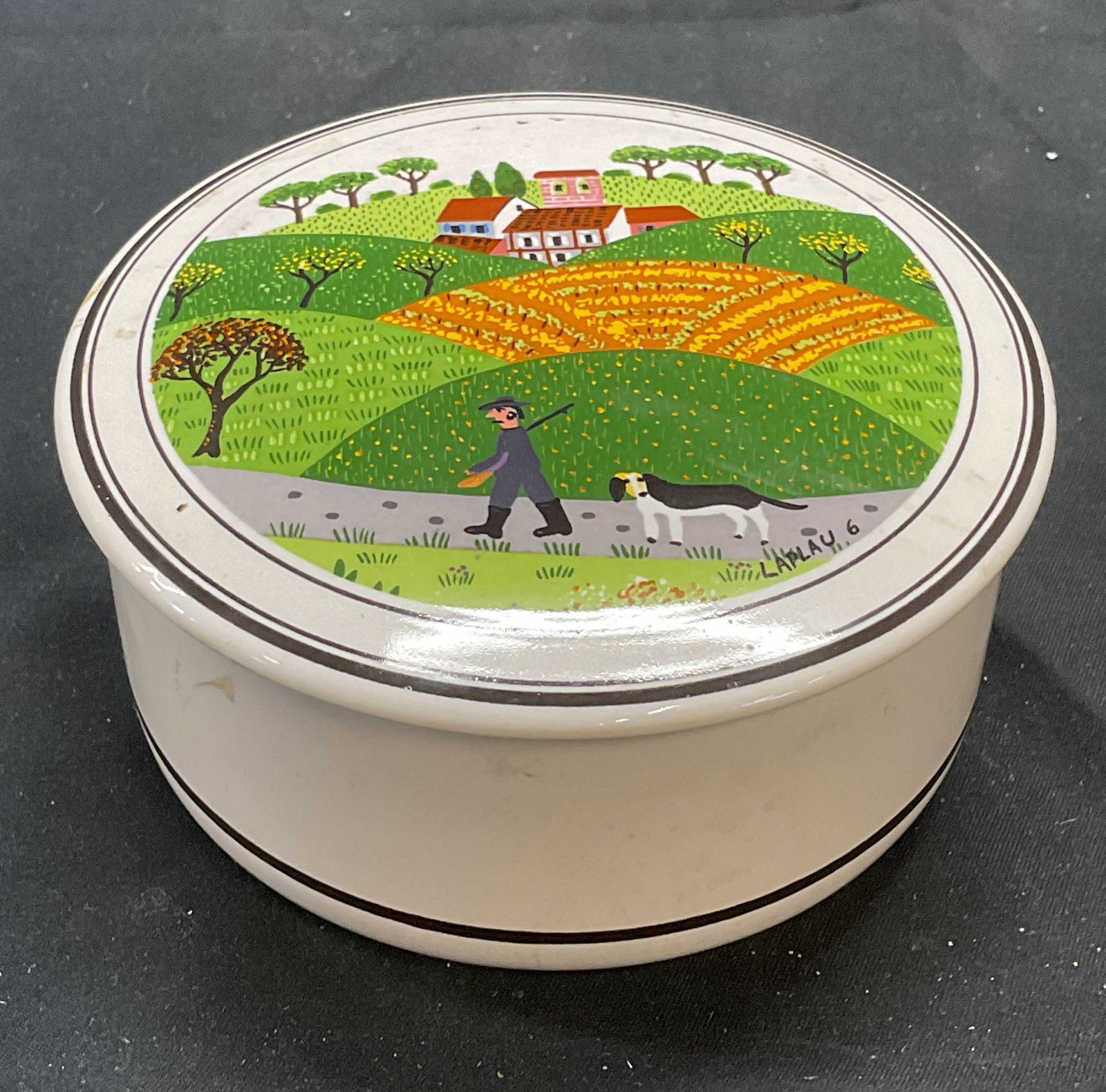 VILLEROY & BOCH Porcelain Naif Lidded Bowl: VILLEROY and BOCH porcelain lidded bowl. Design Naif pattern. Farm motif with figure and dog. Measures approx. 4 x 2 inches. Trademarked to underside. Some surface wear including scratching observed. 