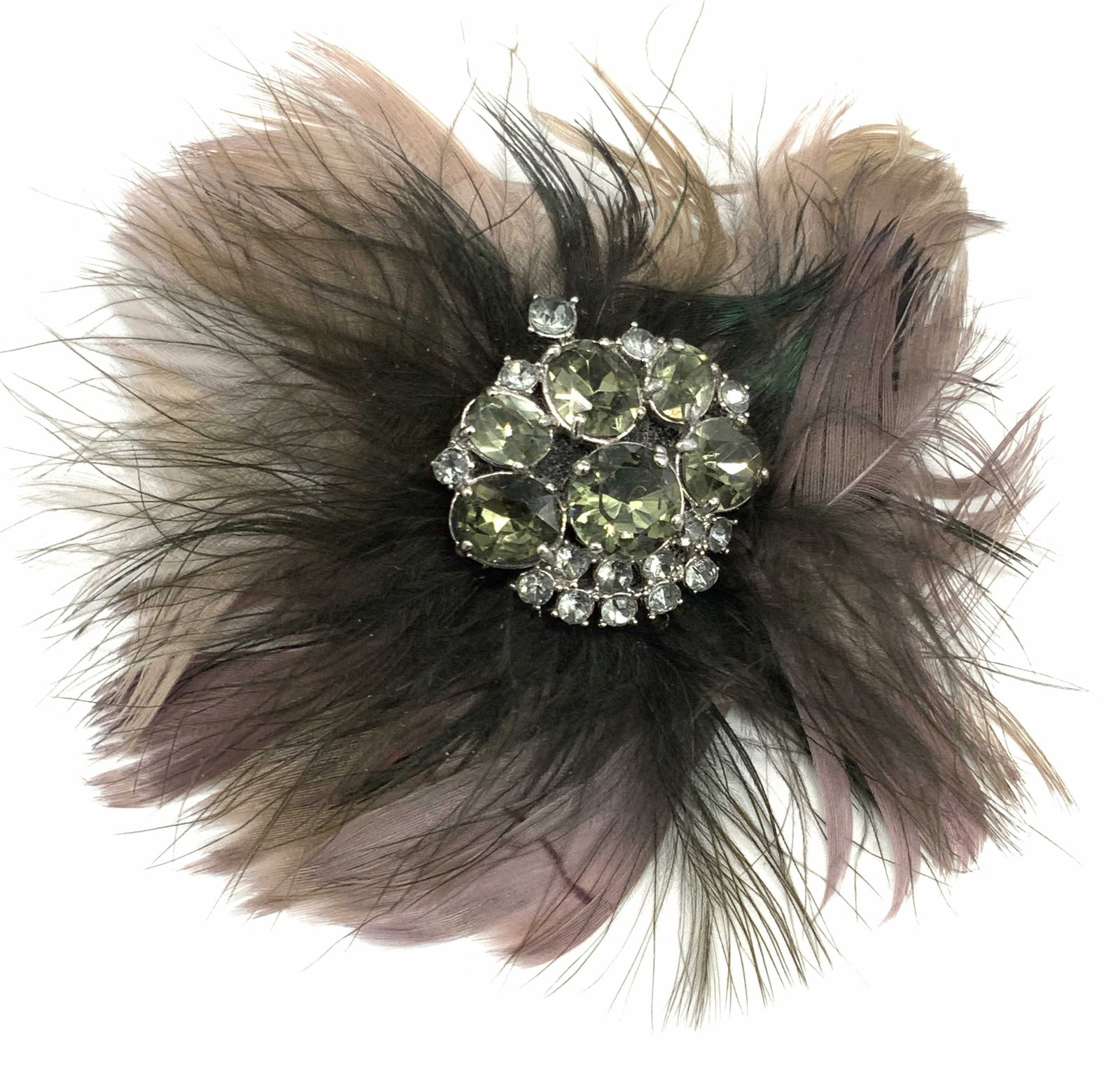 Vintage Trademarked Crystal Feather Brooch: A vintage brooch featuring a faceted crystal cluster to the center surrounded by pink and brown hued feathers. Trademarked with a heart to reverse. Metal pin closure to reverse. Measures approx. 4L x