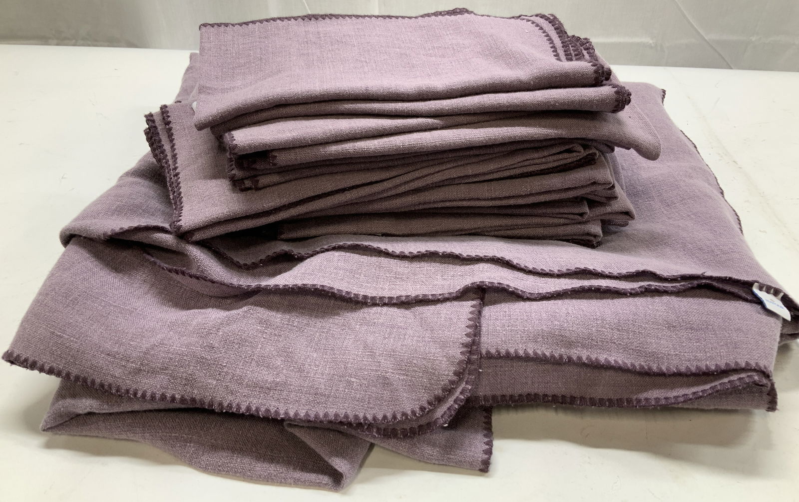 MATOUK Eggplant Linen Blend Tablecloth, Napkins 21: MATOUK luxury brand table linens. 1 tablecloth with 20 napkins. 50%/50% linen/polyester. Napkins are 21 x 21 in. Tablecloth measures 140 in. x 71 in. Luxury brand table linens, house linens, matouk li