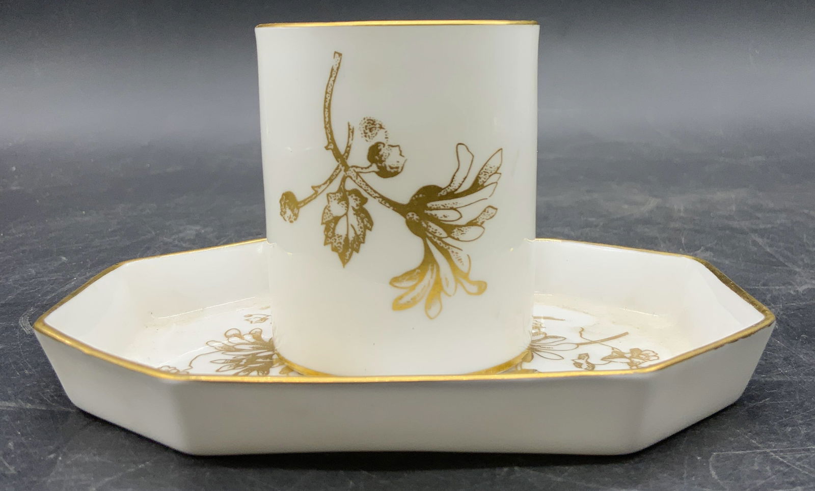 Set 2 HAMMERSLY & CO. Toothpick Holder & Dish, Eng: A set consisting of a vintage porcelain toothpick holder and trinket dish. Primarily white with gilt florals and foliage. The underside is signed HAMMERSLY & CO. BONE CHINA, MADE IN ENGLAND. Toothpick