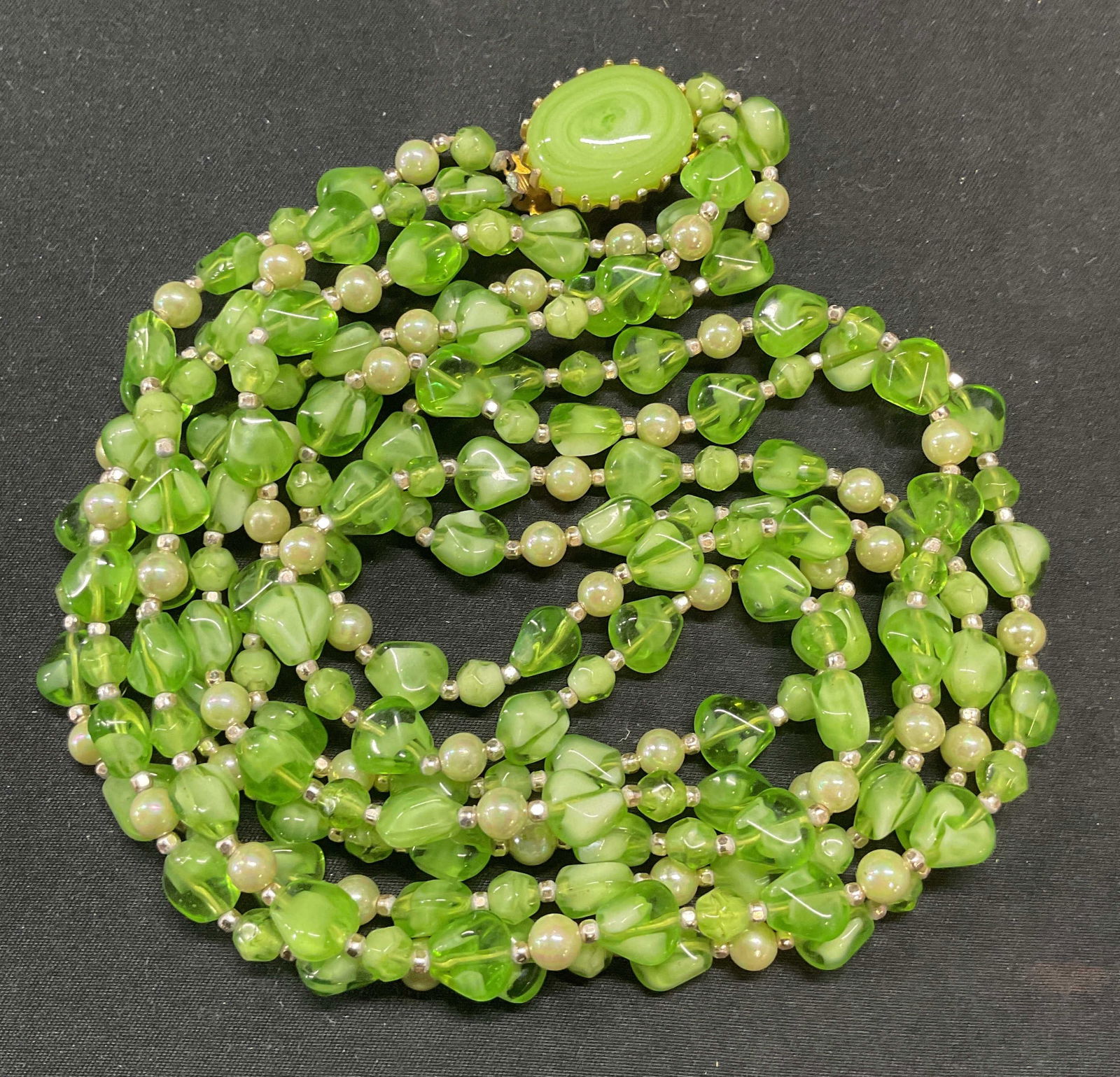 Vintage Green Glass & Faux Pearl Necklace: Vintage green glass and faux pearl beaded multi strand necklace. Drop length approx. 12 inches. Some surface wear including scratching observed. Jewelry, estate jewelry, costume jewelry, cocktail jewe