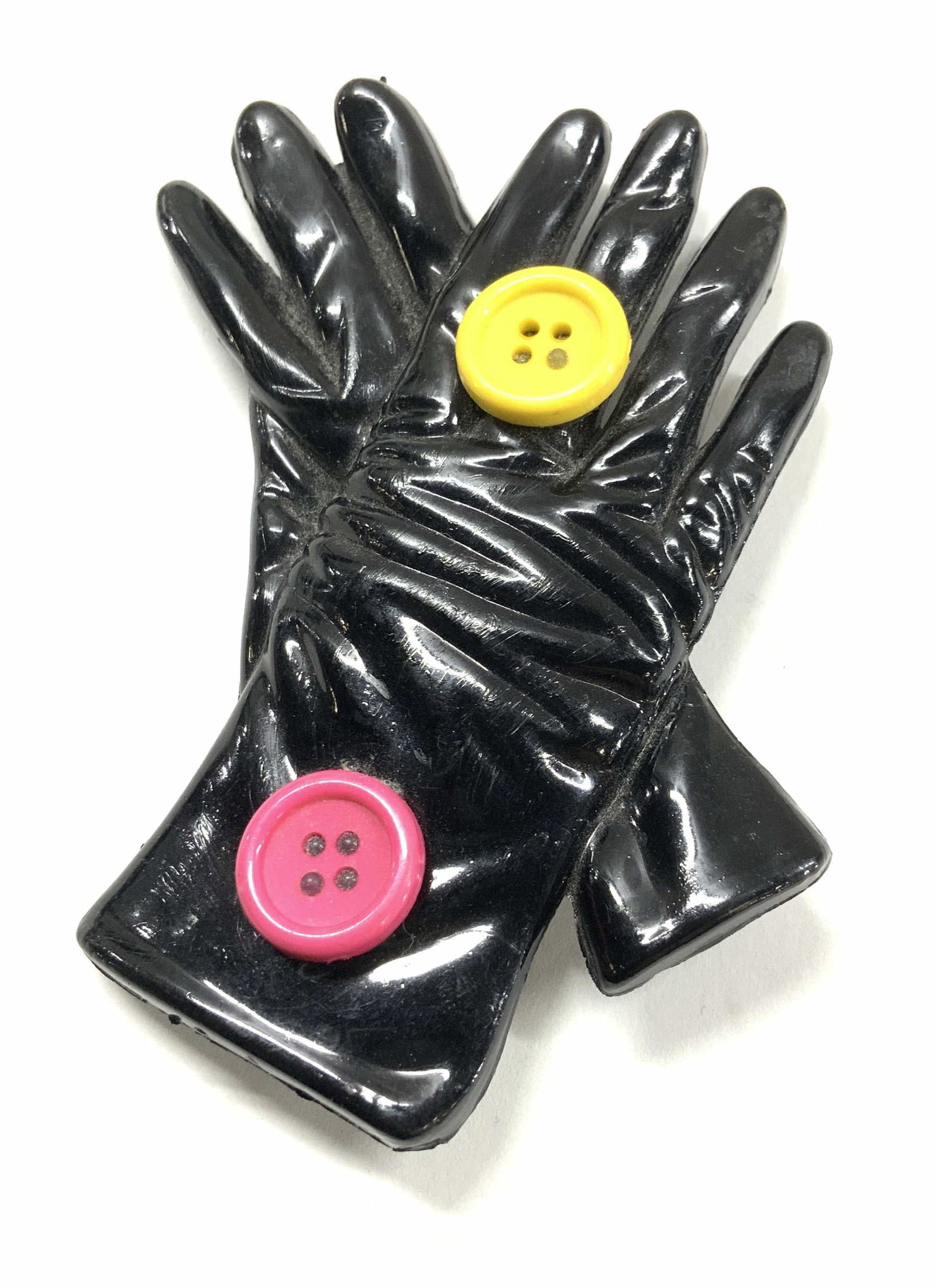 Black Novelty Gloves Brooch w Buttons: Black leather glove - look brooch with a yellow and pink button. Composite material. Measures 3 x 2 in. Luxury Statement jewelry, Luxury Chunky Jewelry, Luxury Estate Jewelry, luxury estate sale jewel