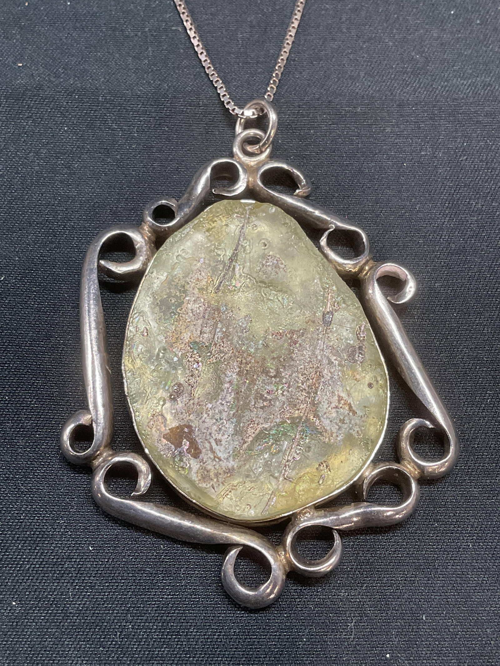 Signed Sterling Silver Pendant Necklace, Israel: Signed Avis Offer sterling silver chain necklace and sterling silver pendant with crystal. Signed on underside of pendant, partially legible. Marked 925. Made in Israel. Chain marked 925, Italy. Drop 