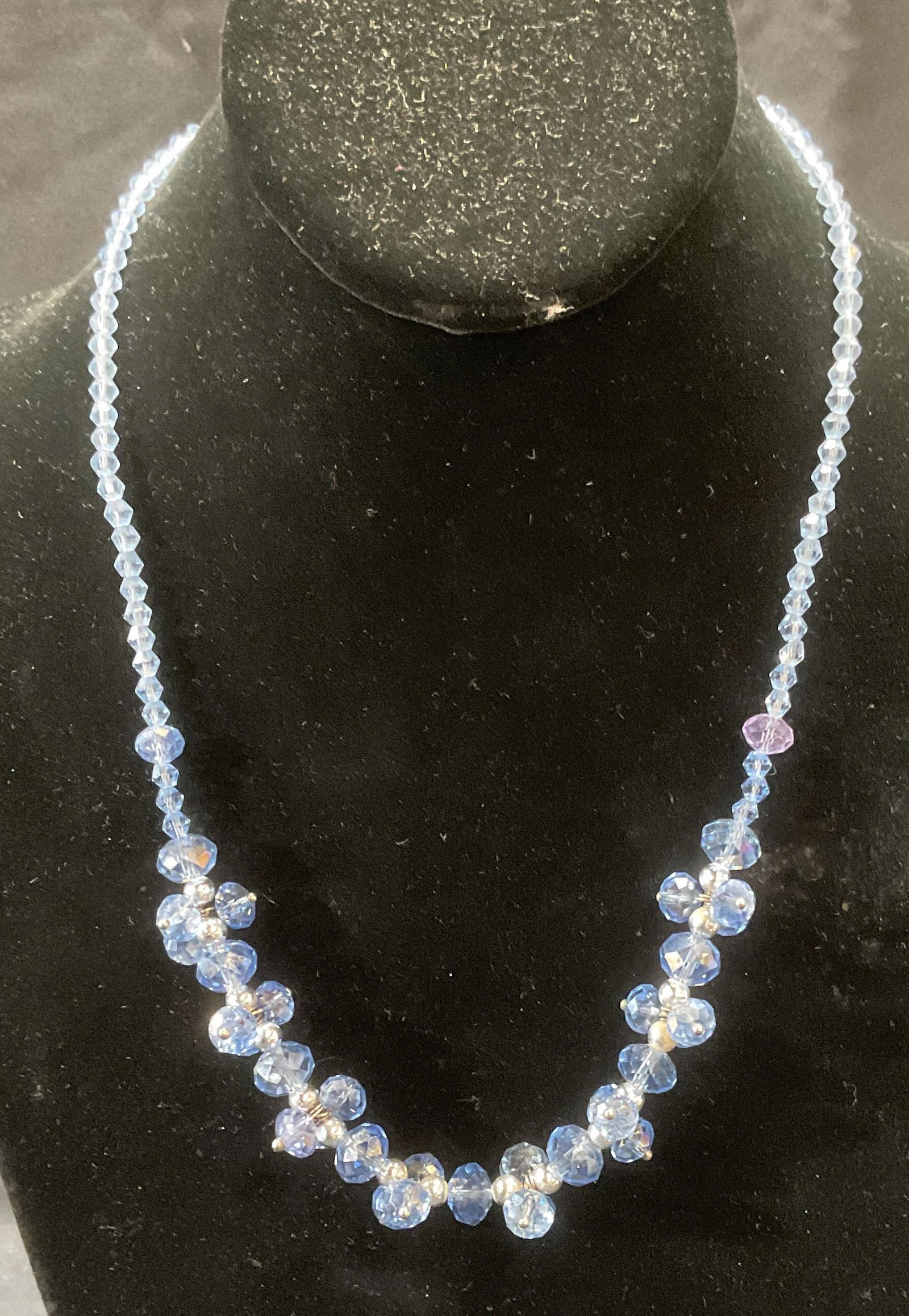 Silver Tone Blue Crystal Beaded Necklace: Blue crystal beaded necklace with silver tone accent beads. Drop length approx. 10 inches. Some surface wear including scratching observed. Jewelry, estate jewelry, costume jewelry, cocktail jewelry,