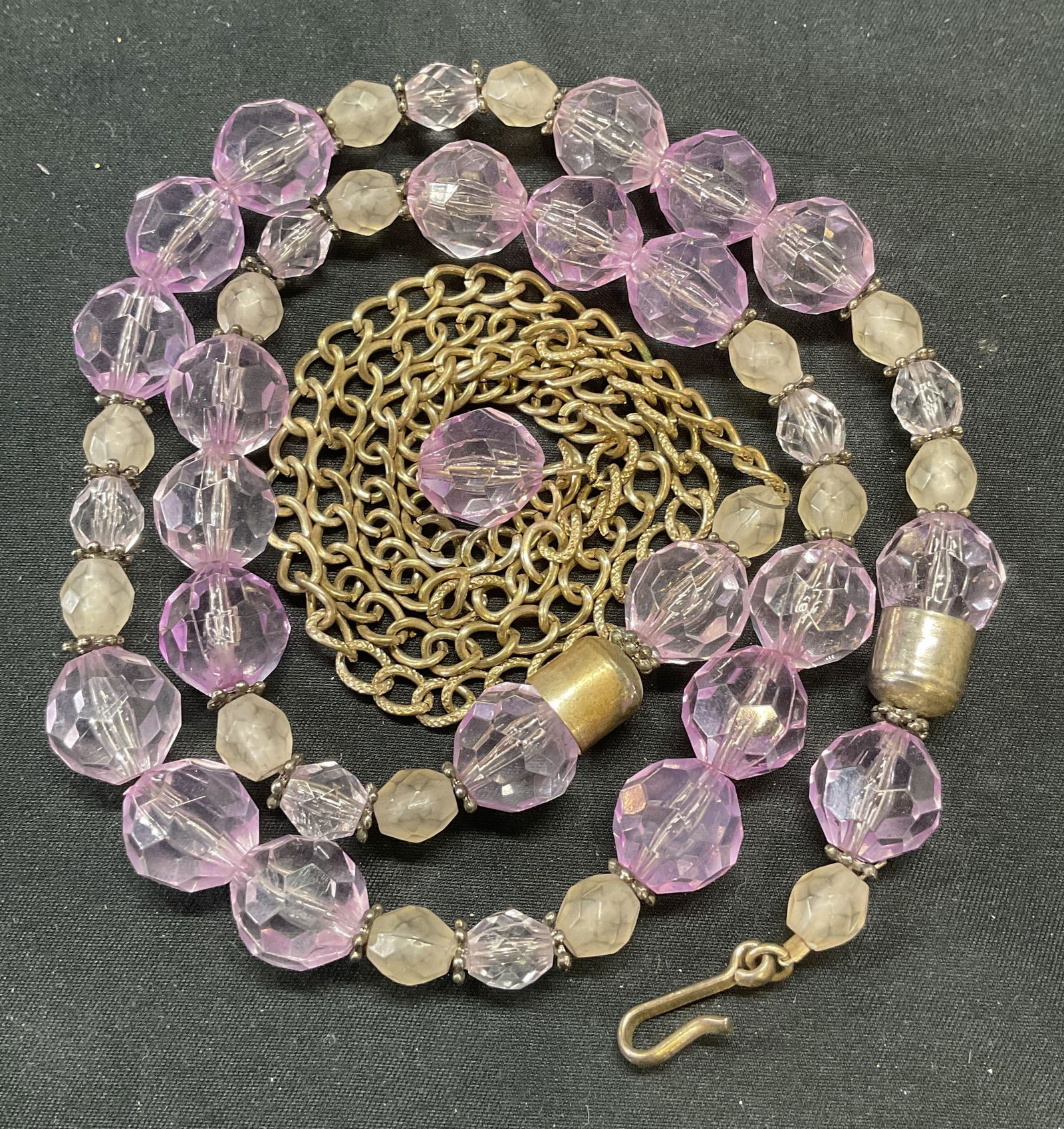 Vintage Silver Tone Purple Crystal Beaded Necklace: Vintage silver tone necklace with purple and colorless faceted crystal beads. Drop length approx. 22 inches. Some surface wear including scratching observed. Estate jewelry, costume jewelry, fashion j