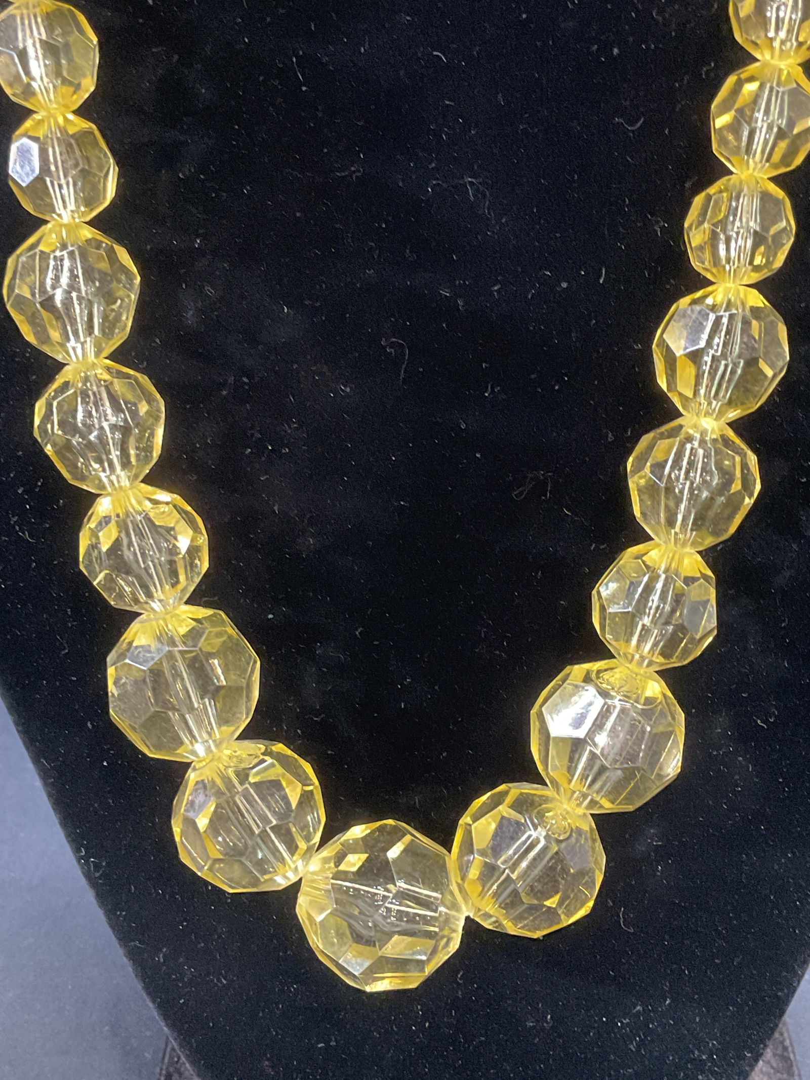Yellow Crystal Beaded Necklace: Beaded necklace with yellow toned graduated crystal beads. Drop length approx. 12.5 inches. Some surface wear including scratching observed. Jewelry, estate jewelry, costume jewelry, cocktail jewelry,