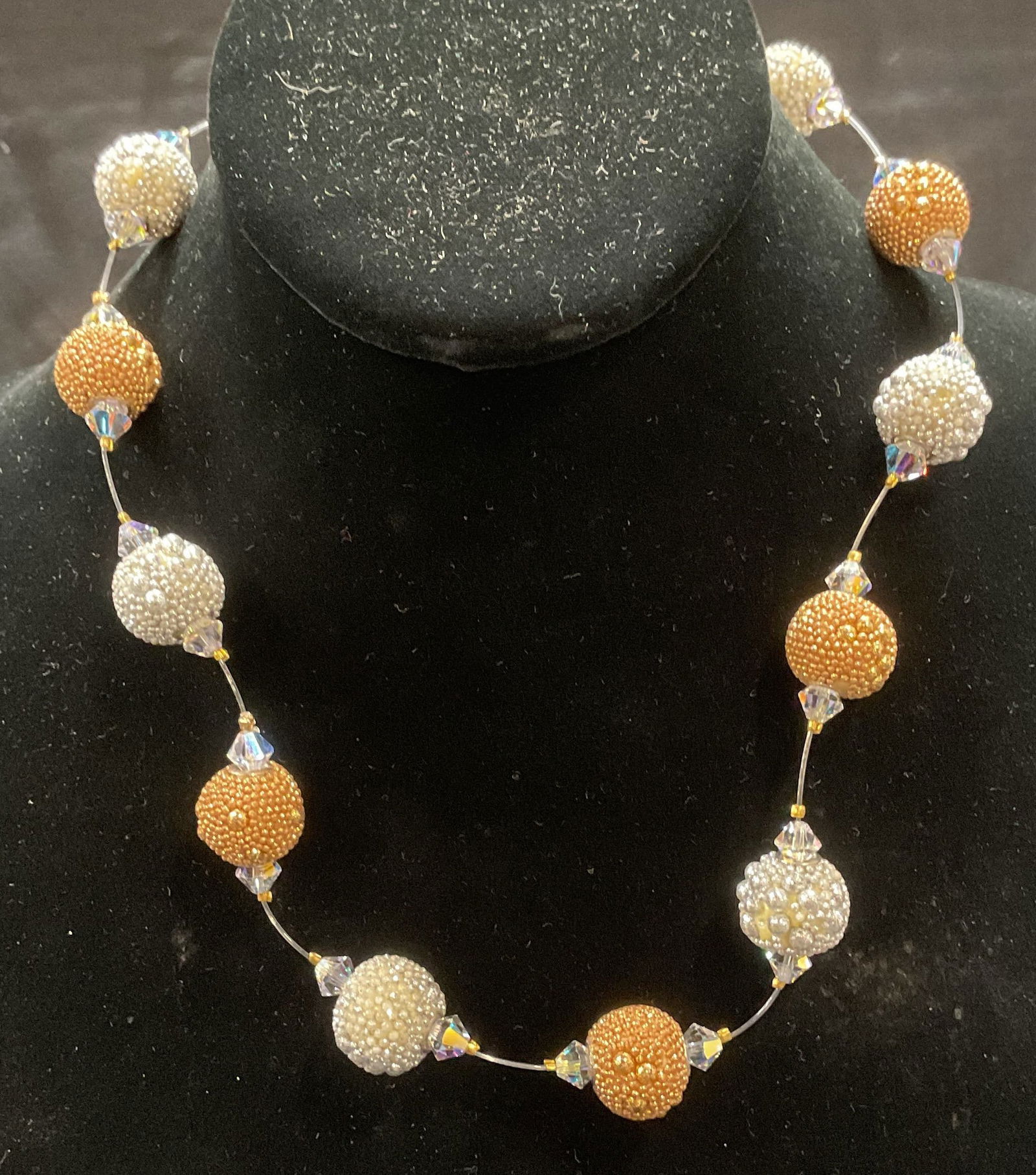 Gold & Silver Tone Crystal Beaded Necklace: Gold and silver tone crystal beaded necklace on wire. Drop length approx. 9 inches. Some surface wear including scratching observed. Some crystals need replacement. Jewelry, estate jewelry, costume je
