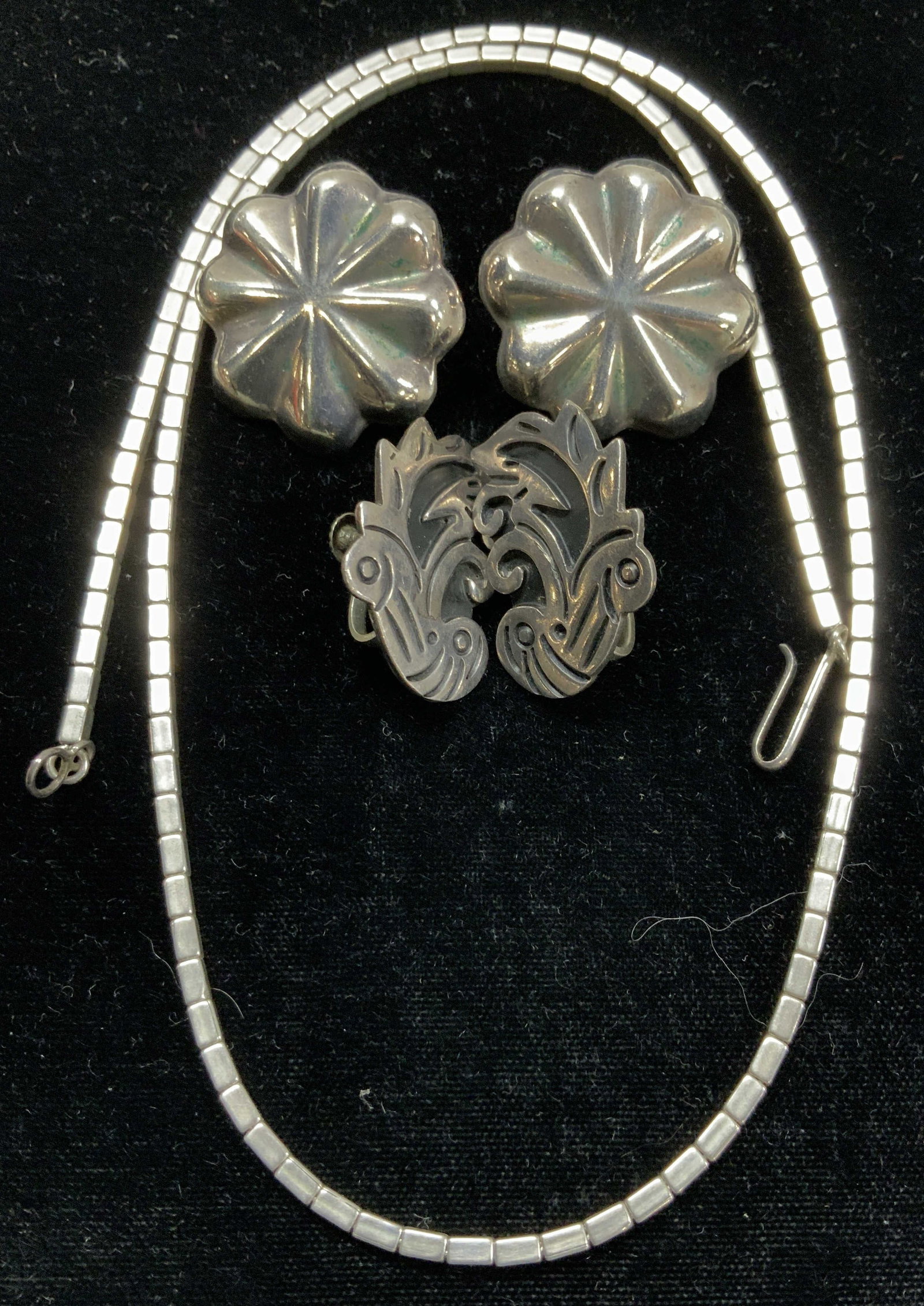 Sterling Silver Necklace & Earrings, 5: Sterling silver jewelry. Necklace and Mexican Sterling earrings are marked .925 or sterling. Embossed pieces std earrings measure 1 in. sterling bead necklace has an 8 in. Drop. 1.44 ozt. Luxury State
