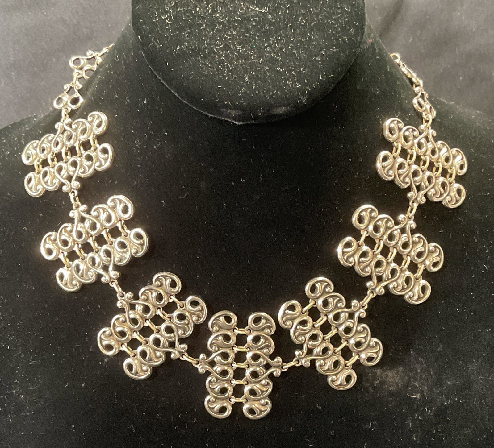Jan Michaels Silver Tone Choker Necklace: Jan Michael silver tone choker necklace with ornate panel decoration. Signed on hang tag. Drop length approx. 6 inches. Some surface wear including scratching observed. Jewelry, estate jewelry, costum
