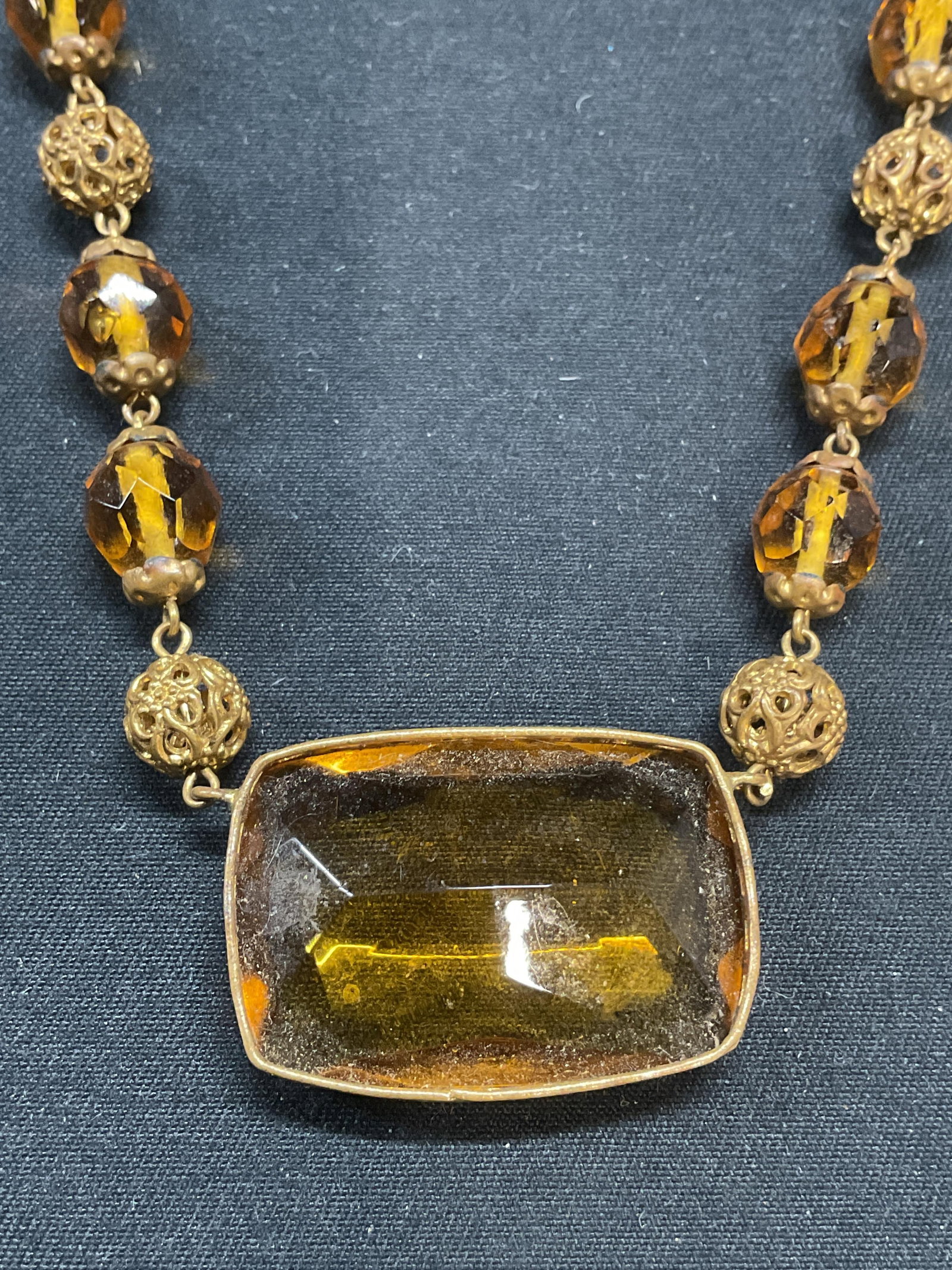 Vintage Gold Tone Crystal Choker Necklace: Vintage gold tone and yellow crystal pendant choker necklace. Drop length approx. 7 inches. Some surface wear including scratching observed. Jewelry, estate jewelry, costume jewelry, cocktail jewelry,