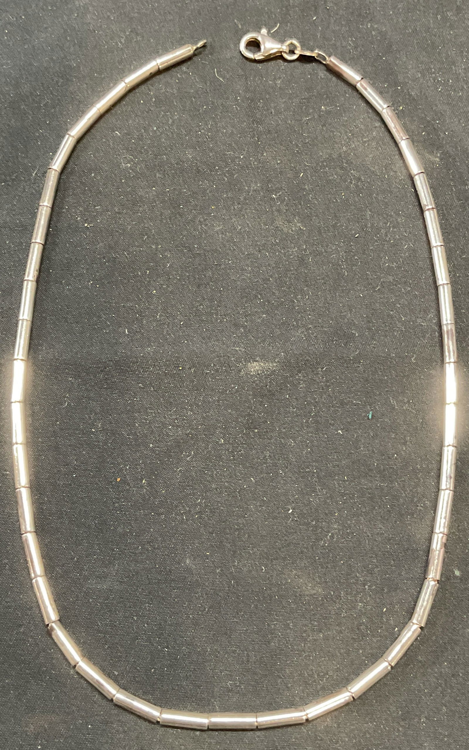 Vintage Italian Sterling Silver Chain Necklace: Vintage Italian designer beaded sterling silver chain necklace. Signed illegibly on hand tag. Marked 925, Italy. Drop length approx. 7.5 inches. Total weight .73 ozt. Includes jewelry case. Some surfa