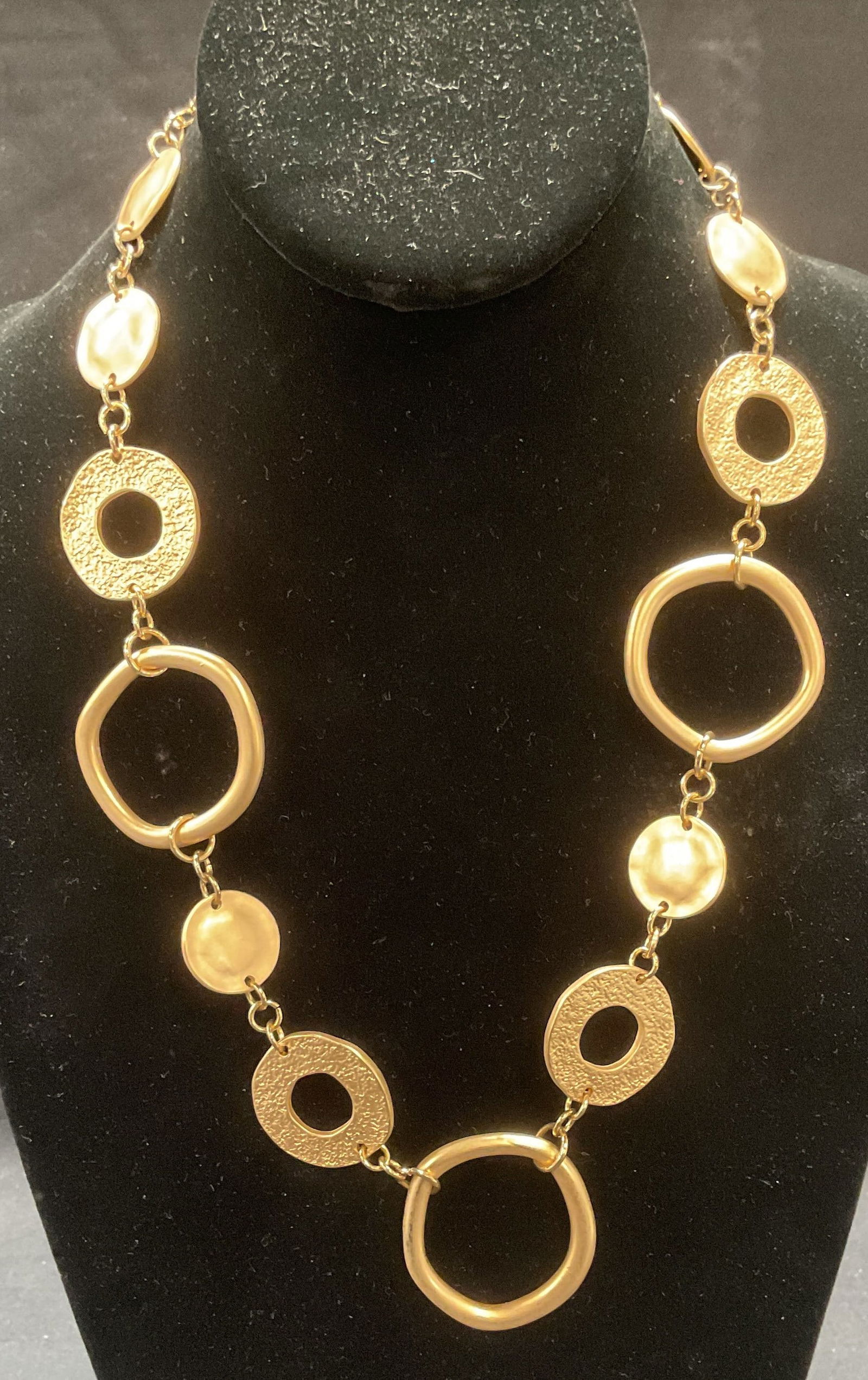 Gold Tone Open Circle Disc Necklace: Gold tone open circle and disc beaded necklace. Drop length approx. 10 inches. Piece has weight. Some surface wear including scratching observed. Jewelry, estate jewelry, costume jewelry, cocktail jew