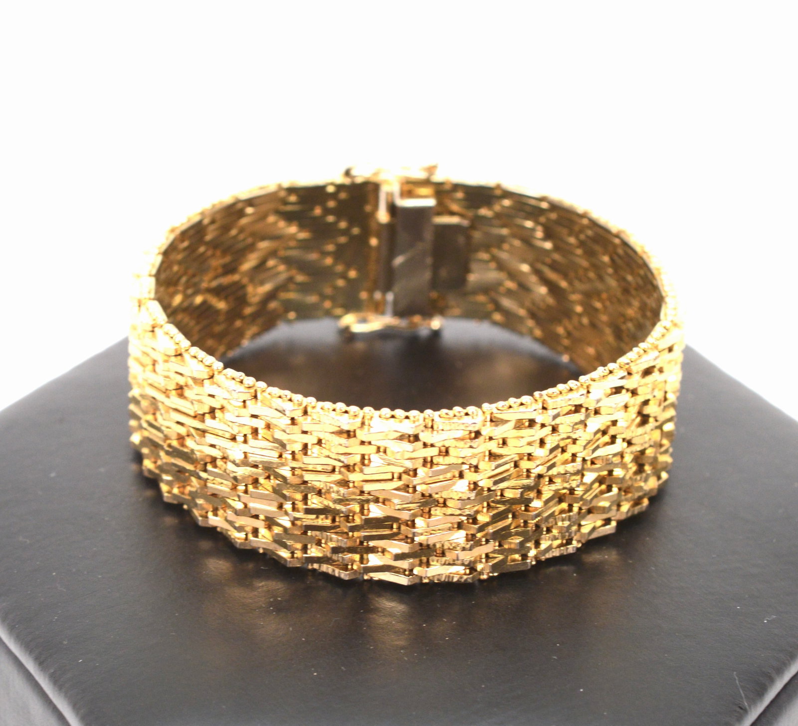 Vintage 7.5IN Gold Plated Wide Statement Bracelet: This is a great piece of vintage jewelry. The alternating finishes on the bracelet make it a real eye catcher. It is 7.5 IN long with a box clasp and double safety. It is 3/4 IN wide. Its flexible and