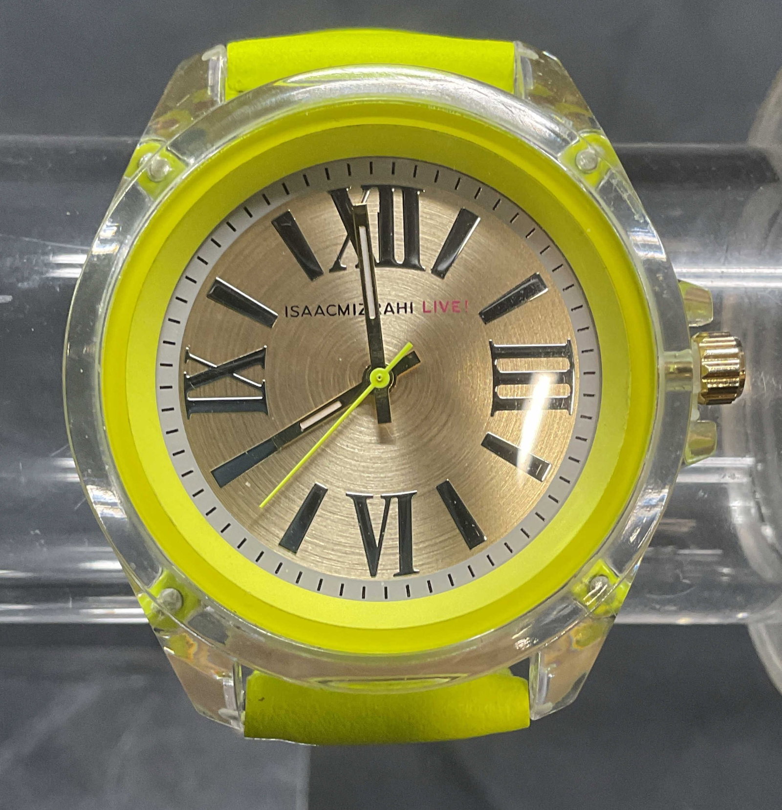 Isaac Mizrahi Live Yellow Leather Watch: Isaac Mizrahi Live! bright yellow leather watch. Signed on dial. Measures approx. 9 inches long. Not tested for function. Some surface wear including scratching observed. Jewelry, estate jewelry, cost