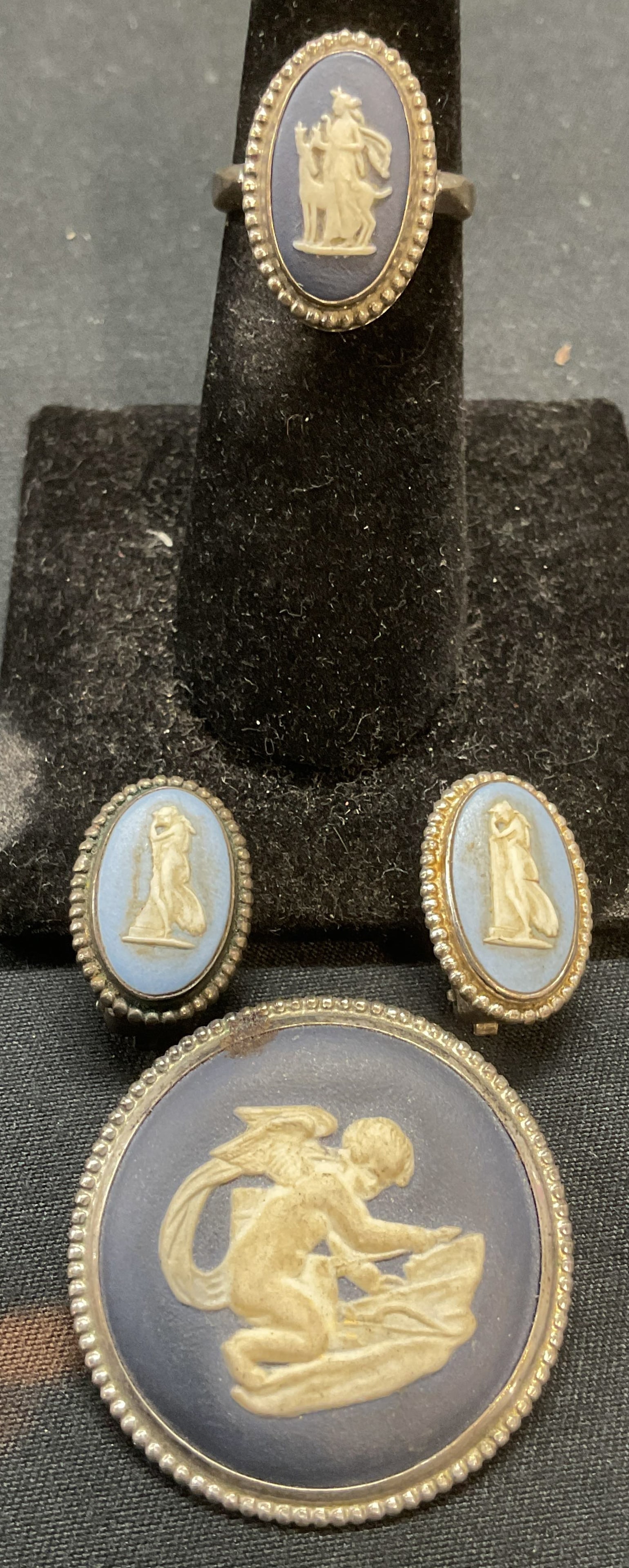 Lot 3 JW & FAW Sterling Silver Wedgwood Jewelry: Lot of 3 vintage Wedgwood Jasperware cameo jewelry pieces. 1 brooch signed JW with silver hallmark, 1 ring signed JW with silver hallmark, and 1 pair of clip on earrings signed FAW and JW and marked s