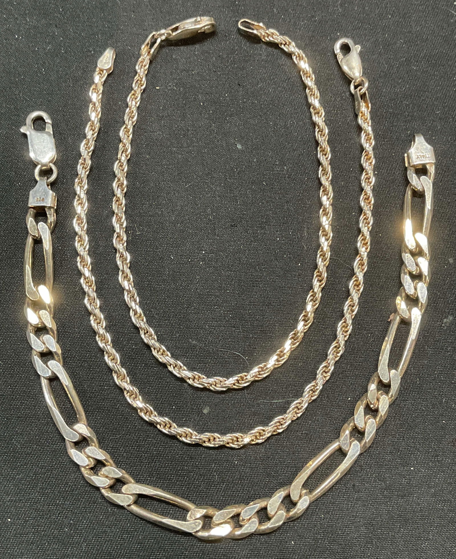 Lot 3 Sterling Silver Chain Bracelet, Italy: Lot of 3 sterling silver chain bracelets made in Italy. All pieces marked 925, Italy. All bracelets measure approx. 7.75 inches long. Total weight of all pieces .77 ozt. Some surface wear including sc