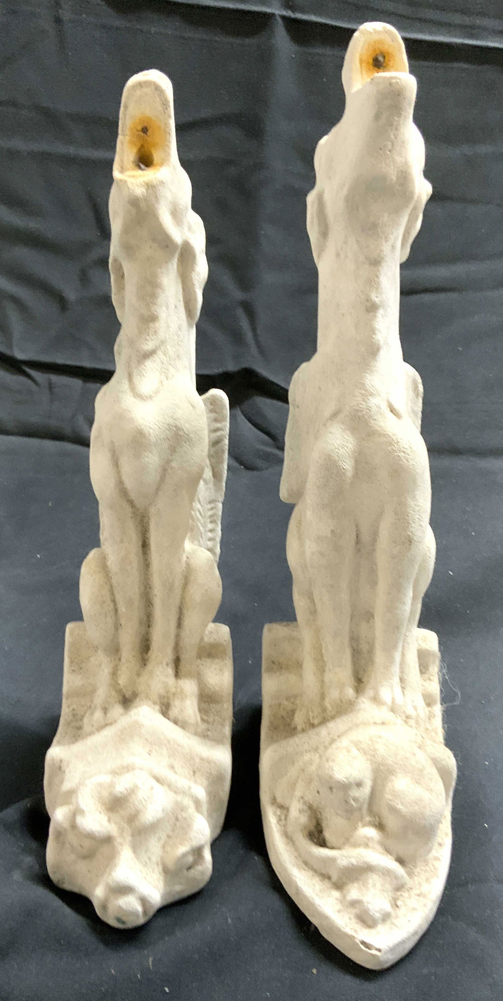 Pair Composite Griffin Form Incense Burners: Lot includes 2 incense burners. Each are white toned and appear to be composite possibly cement, possibly plaster. Each depict a seated griffin figure with open mouth. Each piece measures approximatel