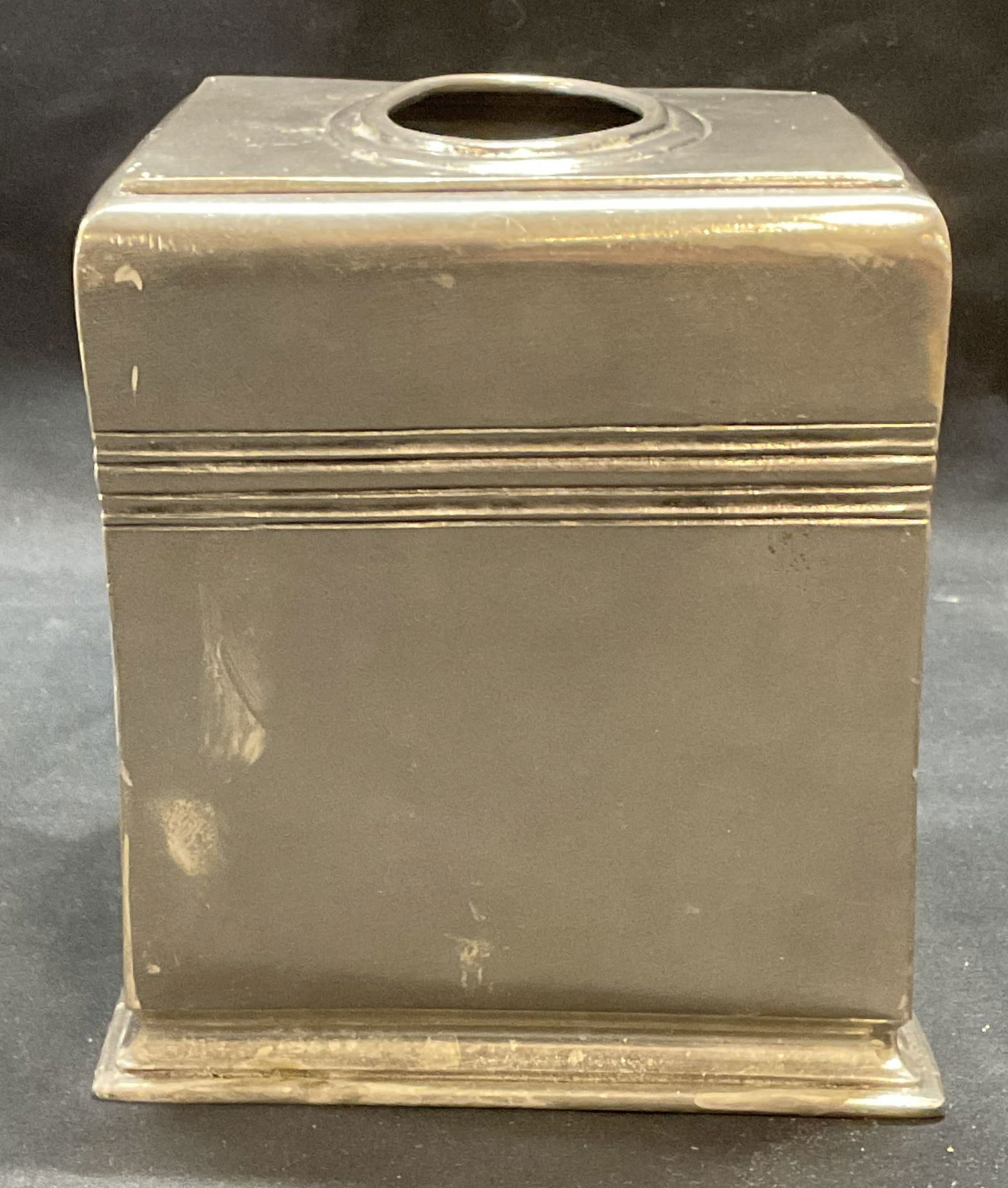 EPU 109 Europe Pewter Tissue Box Cover: EPU 109 Europe pewter tissue box cover. Measures approx. 5 x 5 x 6 inches. Trademarked to interior. Surface wear including scratching and warping observed. EPU 109, EPU 109 pewter, EPU 109 tissue box