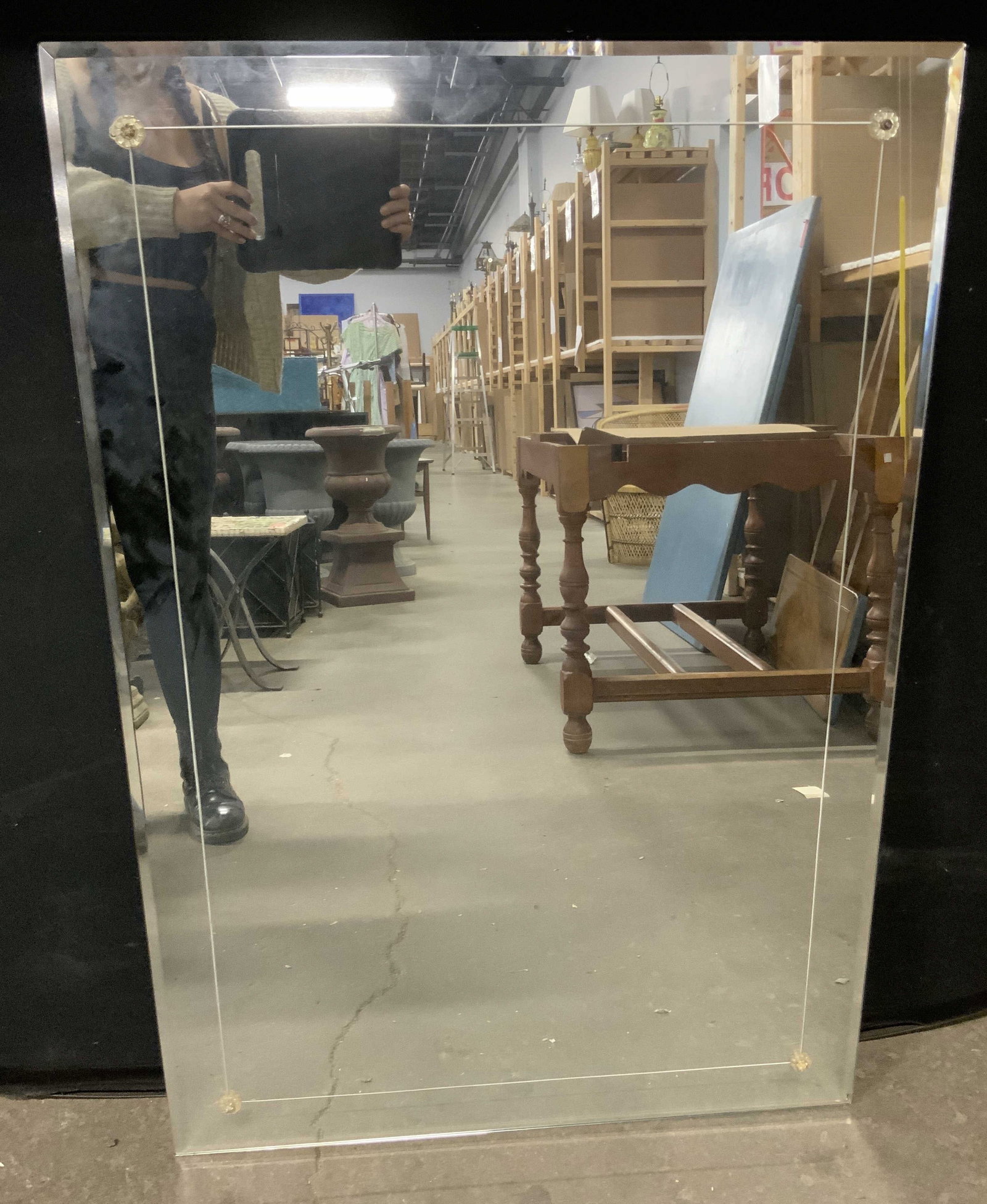 Rectangular Wall Mirror: A rectangular wall mirror. Measures approx. 44L x 30W in. Instructions on hanging mirror to reverse. Chipping and surface wear present. Separation present. Collectibles, home decor, home accents, home