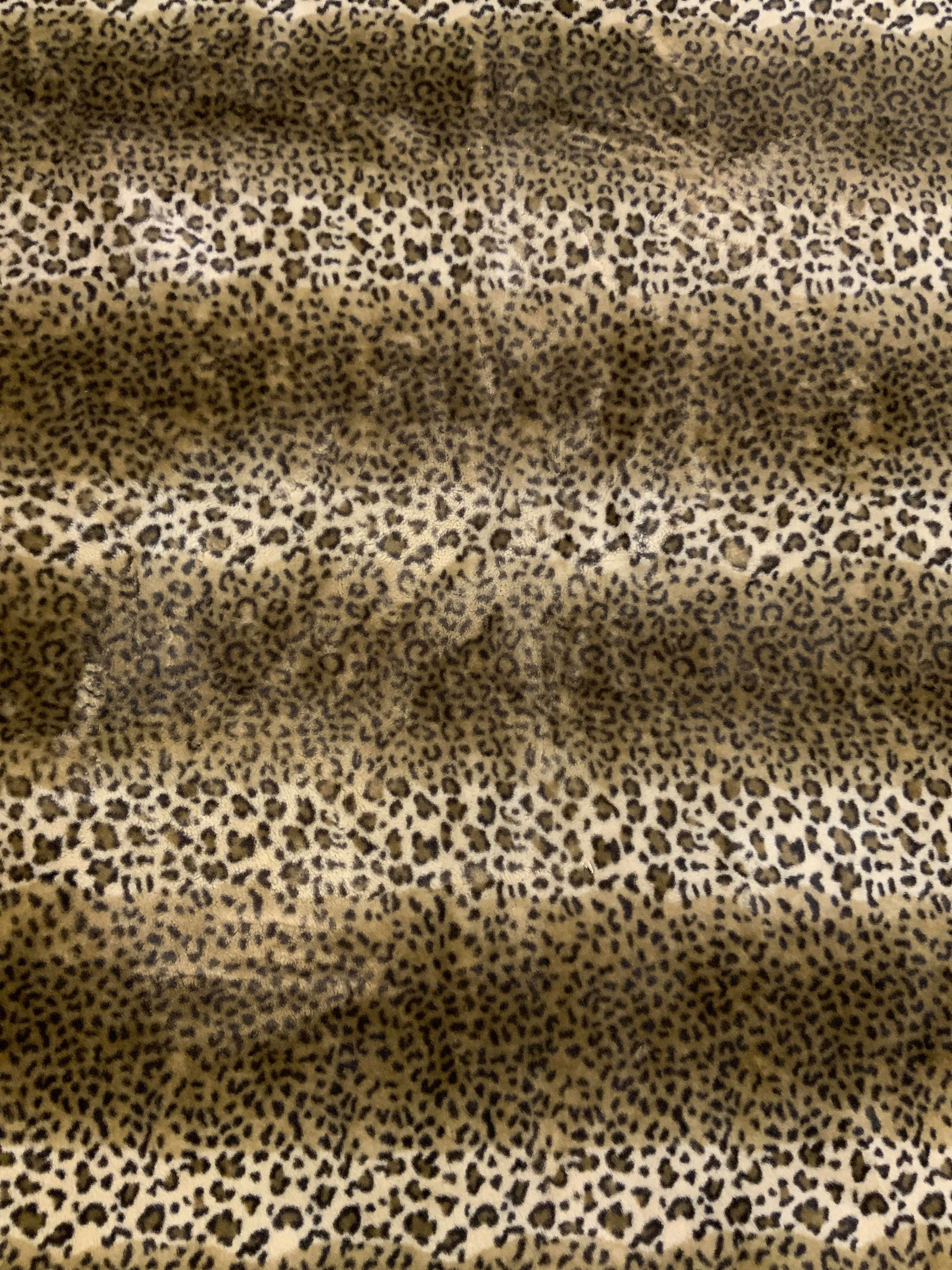 POTTERY BARN Poly Blend Leopard Print Throw: Tag reads POTTERY BARN. Throw had leopard print detail. Piece is a polyester blend. Underside is brown toned. Throw Measures approximately 50 x 60 inches as reads on tag. Throw, polyester throw, potte