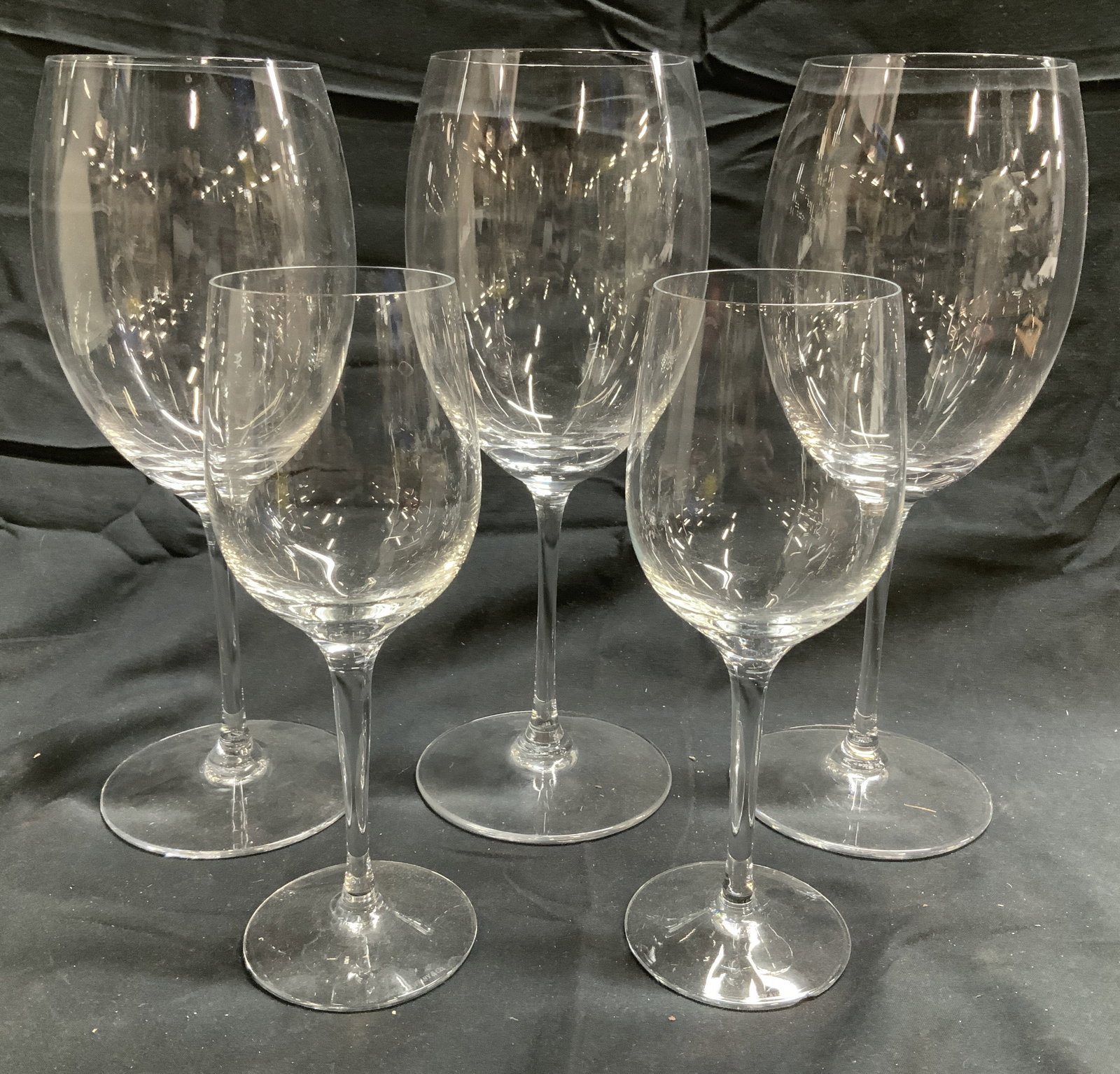 TIFFANY & Co & SEVRES 5 Crystal Wine Goblets: Larger glasses are marked SEVRES on undersides, smaller glasses are trademarked TIFFANY & CO. Lot includes 3 large & 2 small wine glasses. Each piece in lot is crystal. Largest glasses each measure ap