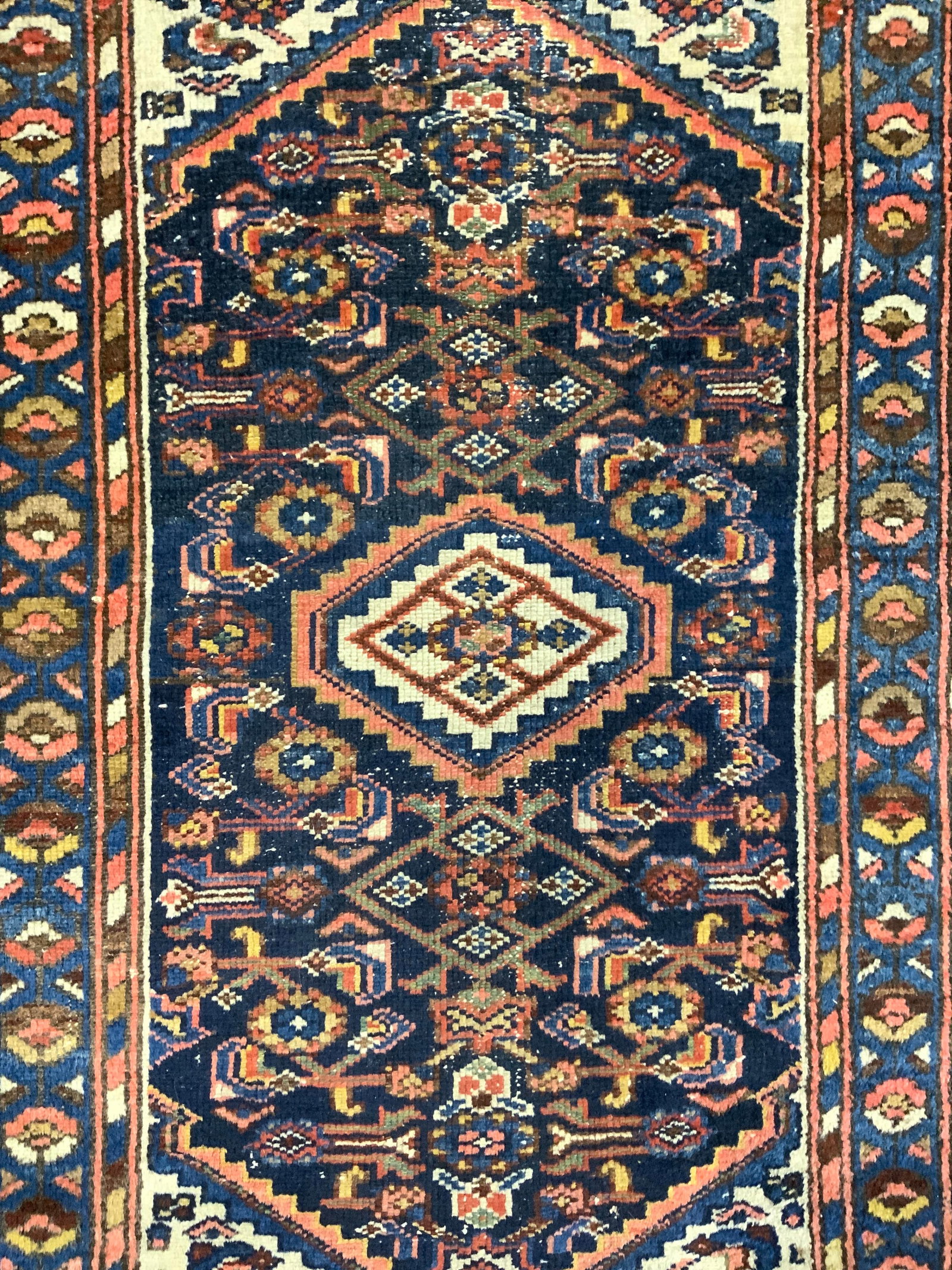 Vintage Handmade Persian Wool Area Rug: Rug is handmade and wool. Piece is vintage appears to be Persian. Rug has intricate multi toned Floral & geometric detail. Rug measures approximately 48 inches long 30 inches wide. Rug, carpet, area r