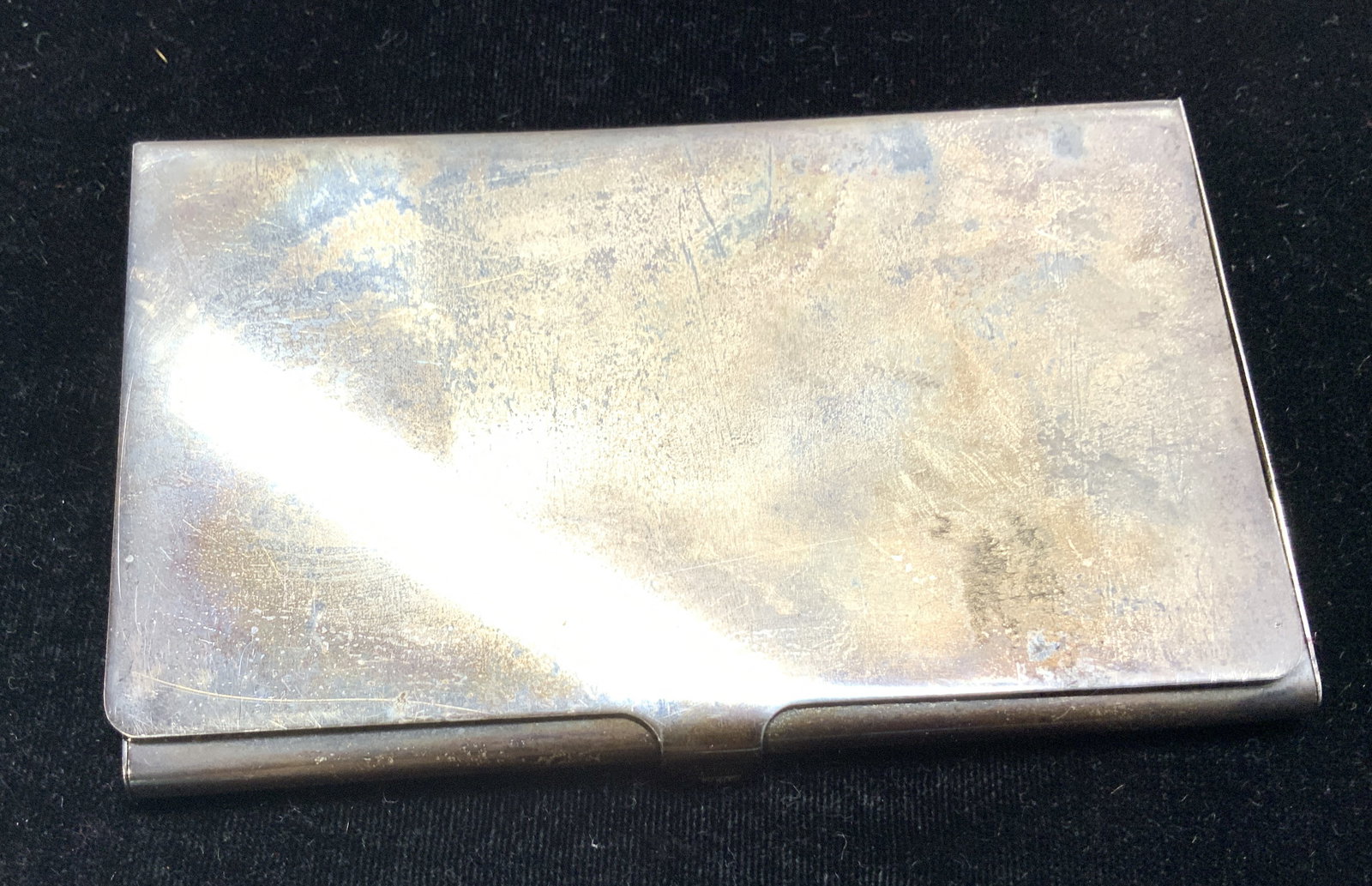 Tiffany & Co Sterling Silver Business Card Holder: 1.81 ozt. Signed Tiffany & Co Sterling silver business card holder. Marked Tiffany & Co and Sterling. Measures 3.75 x 2 3/16 in. Fits cards 3.5 x 2 in. Hollowware, signed Tiffany & Co Sterling silver 