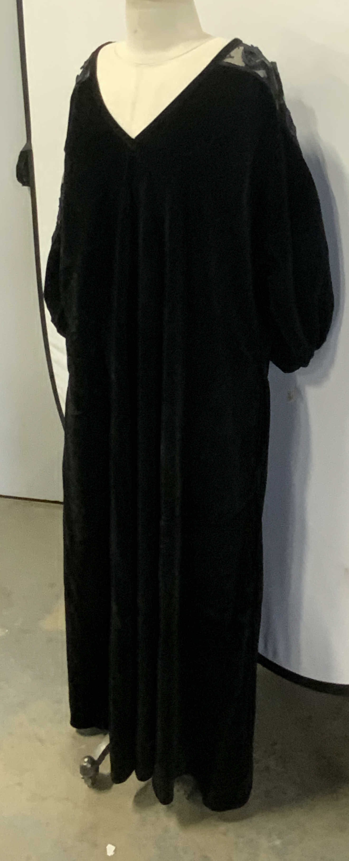 GIVENCHY INTIMATE PARIS Black Velvet Dress, Bx: A vintage black velvet dress / dressing gown / nightdress. Lace accent to the dress. Tag reads GIVENCHY INTIMATE PARIS, AVERAGE. Length measures approx. 58 inches. Length measured on mannequin. Tag at