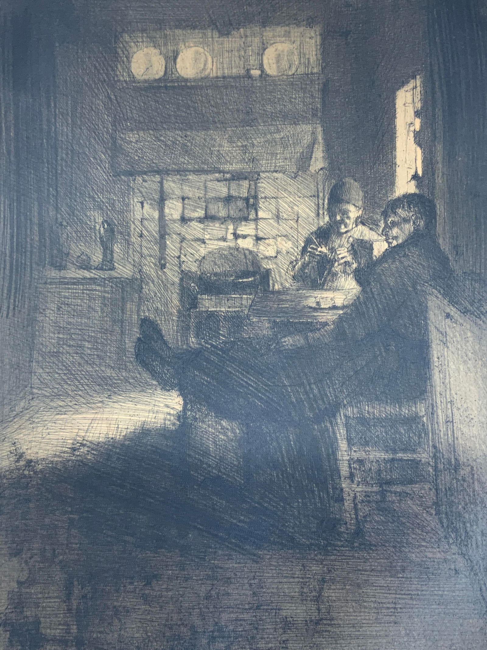 Signed Kitchen Window Drypoint Engraving: Drypoint engraving print on paper. Signed in lower right corner. Signature illegible. Subject depicts to people sitting by the kitchen window. Paper measures approx. 18 H x 15 W in. Inscription on low