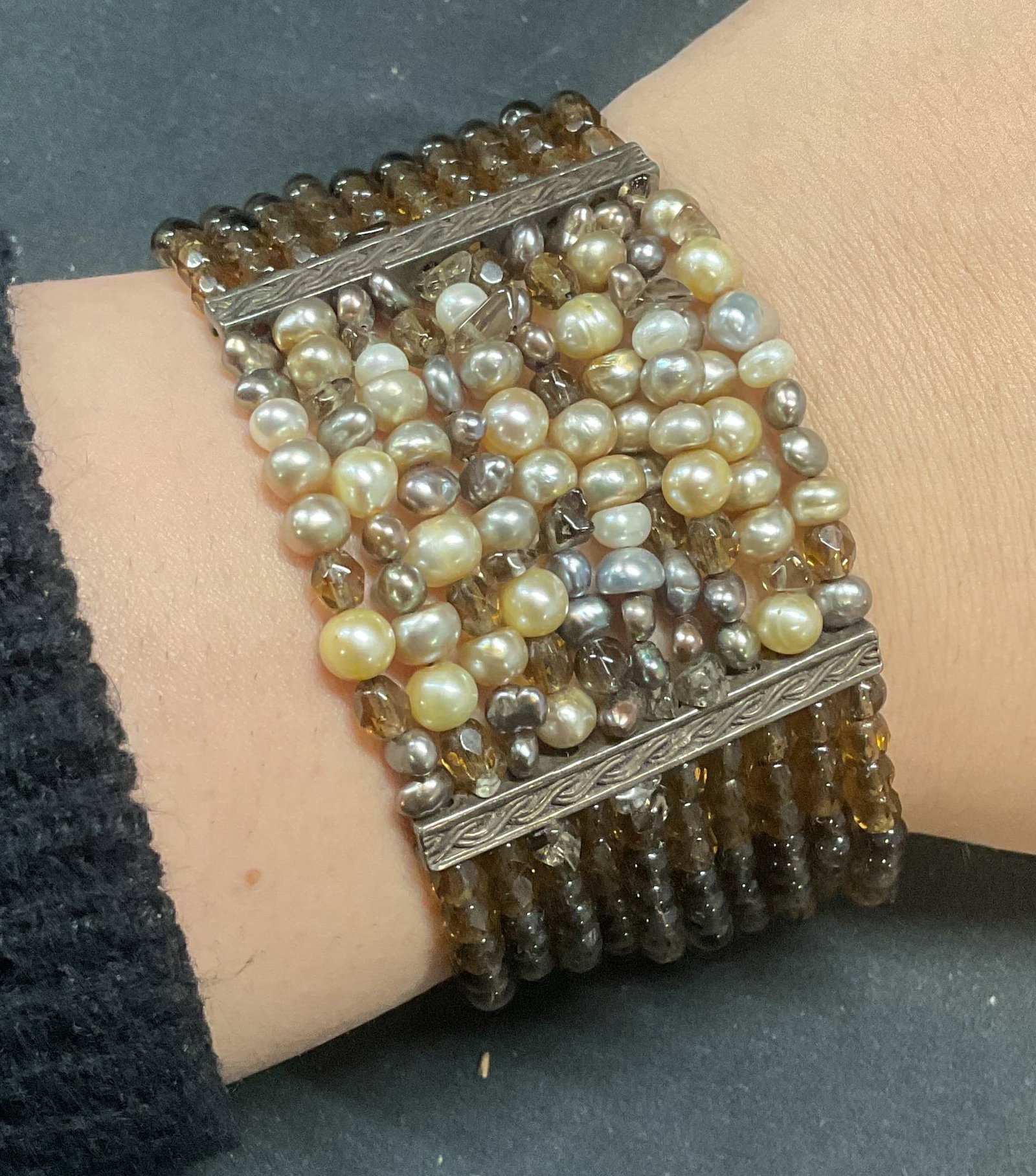 Seed Pearl & Semi Precious Stone Bracelet: Multi strand bracelet with neutral toned seed pearl and semi precious gemstones. Measures approx. 7 inches long. Some surface wear including scratching observed. Jewelry, estate jewelry, fine jewelry,