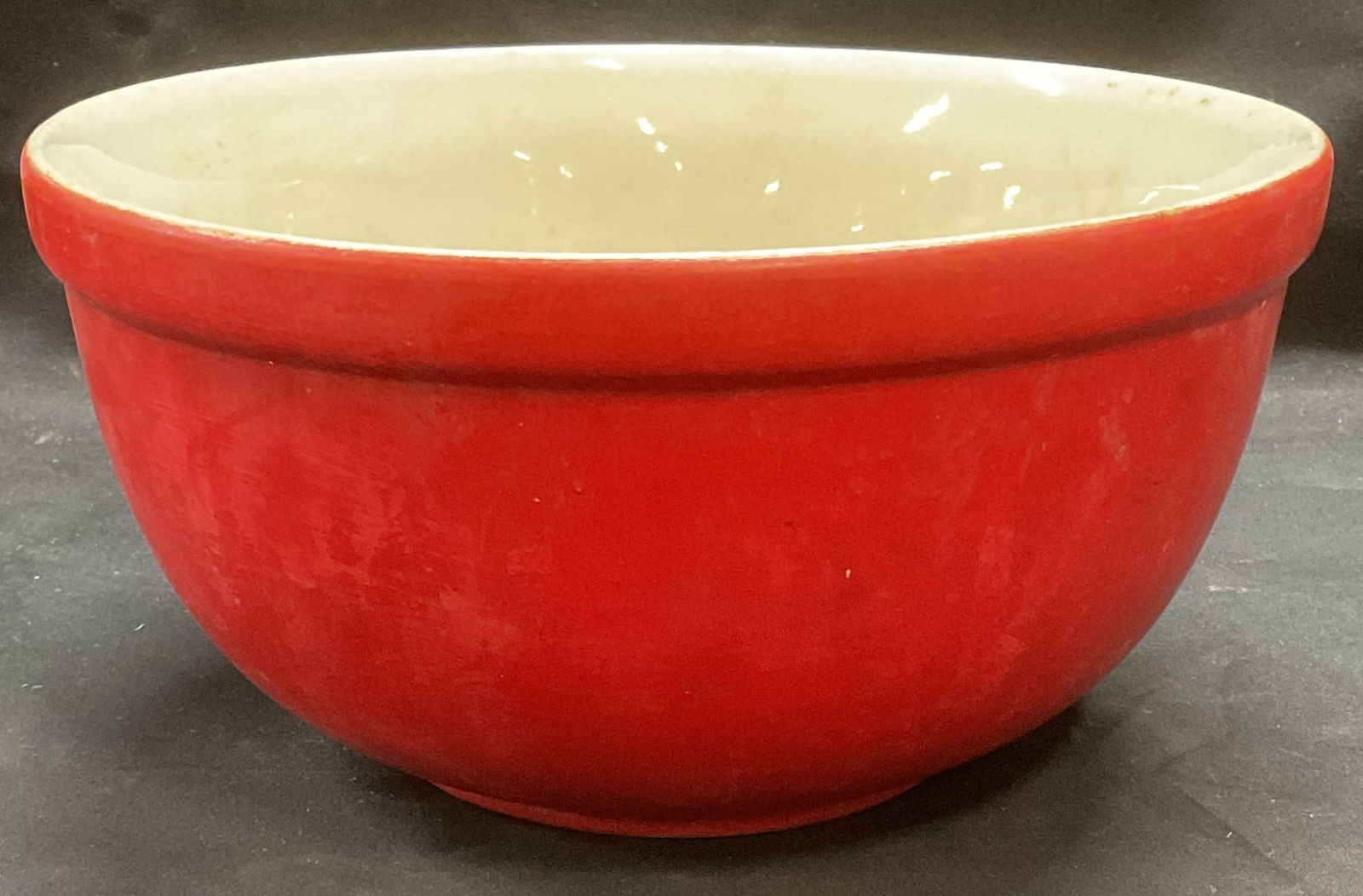 Vintage Halls Kitchenware Red Glass Mixing Bowl: Vintage Halls red glass mixing bowl. Trademarked to underside. Made in USA. Measures approx. 8.5 x 4.5 inches. Some surface wear including scratching, hairline crack, and residue observed. Halls, hall