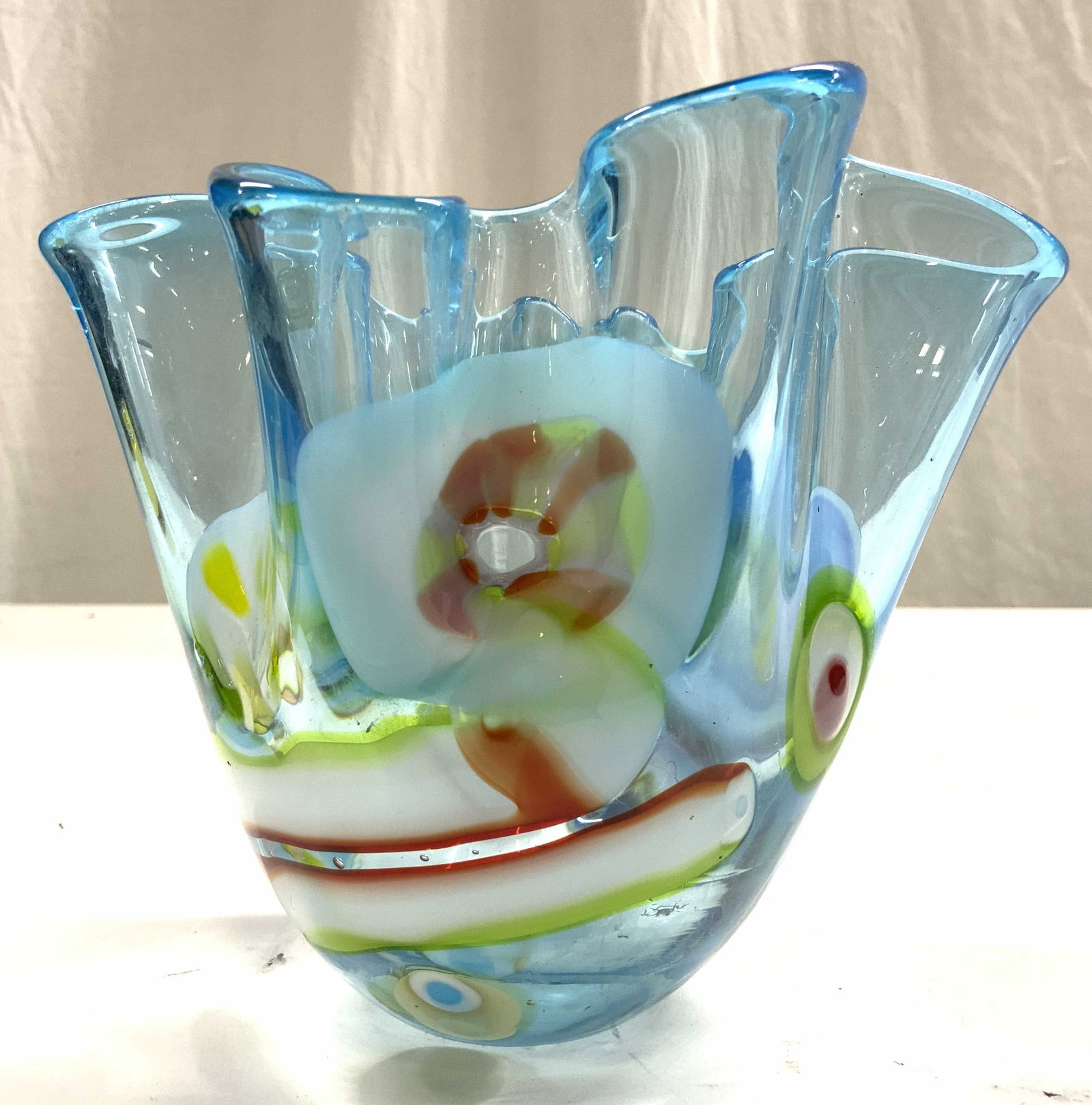 ARTE MURANO ICET Art Glass Handkerchief Vase: Tag and underside reads ARTE MURANO. Vase is Glass. Piece is blue with multi toned detail. Vase has handkerchief form. Vessel measures approximately 5.75 inches tall 6.5 inches wide. Vase, handkerchie