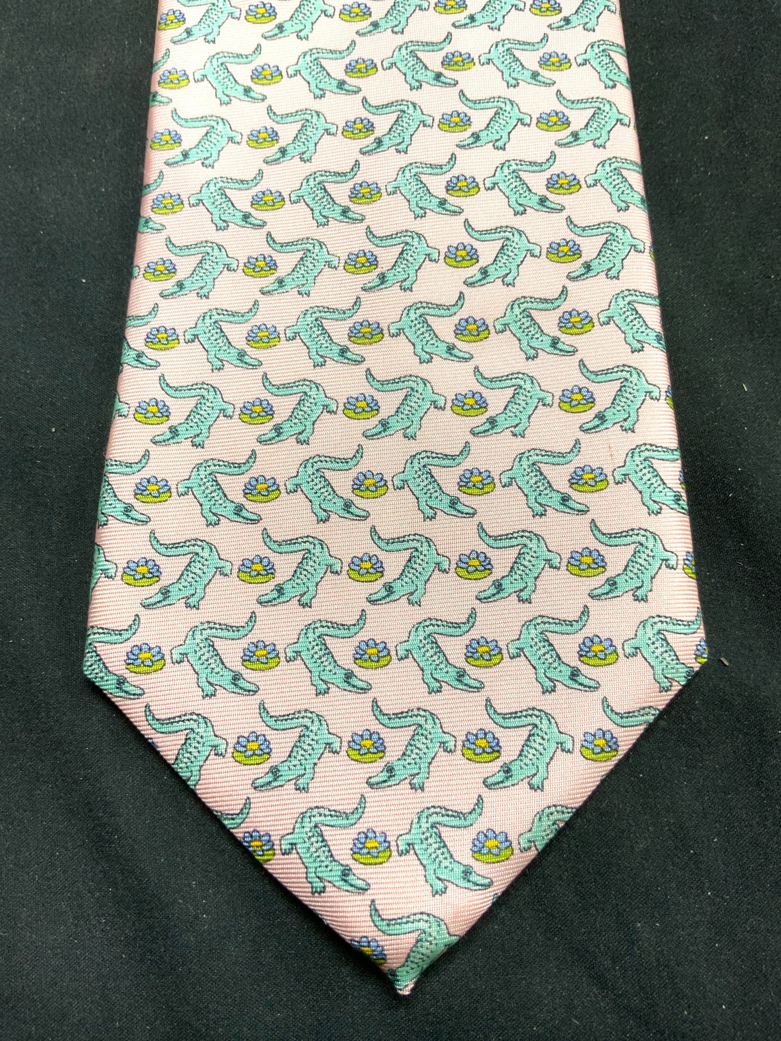 PETER BLAIR Italian Silk Alligator Detail Necktie: Tag reads PETER BLAIR. Piece is pink with green toned alligator and floral pattern detail. Other tag reads ITALIAN SILK. Neckties measures approximately 58 inches long 3.5 inches wide. Tie, neckties, 