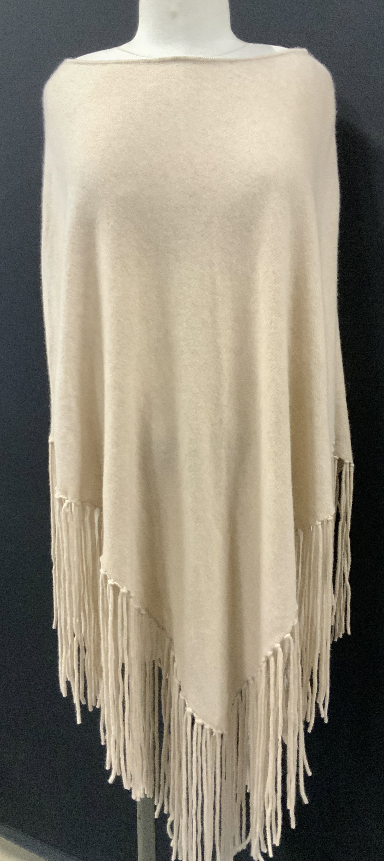 Minnie Rose Cashmere Poncho with Long Tassels: 100% cashmere poncho with tassels, Labeled Minnie Rose , size 0/S. Triangular drape, length 42.5 in. Sides are shorter. Heather Beige cashmere poncho Ladies wearables, luxury cashmere poncho, Minnie r