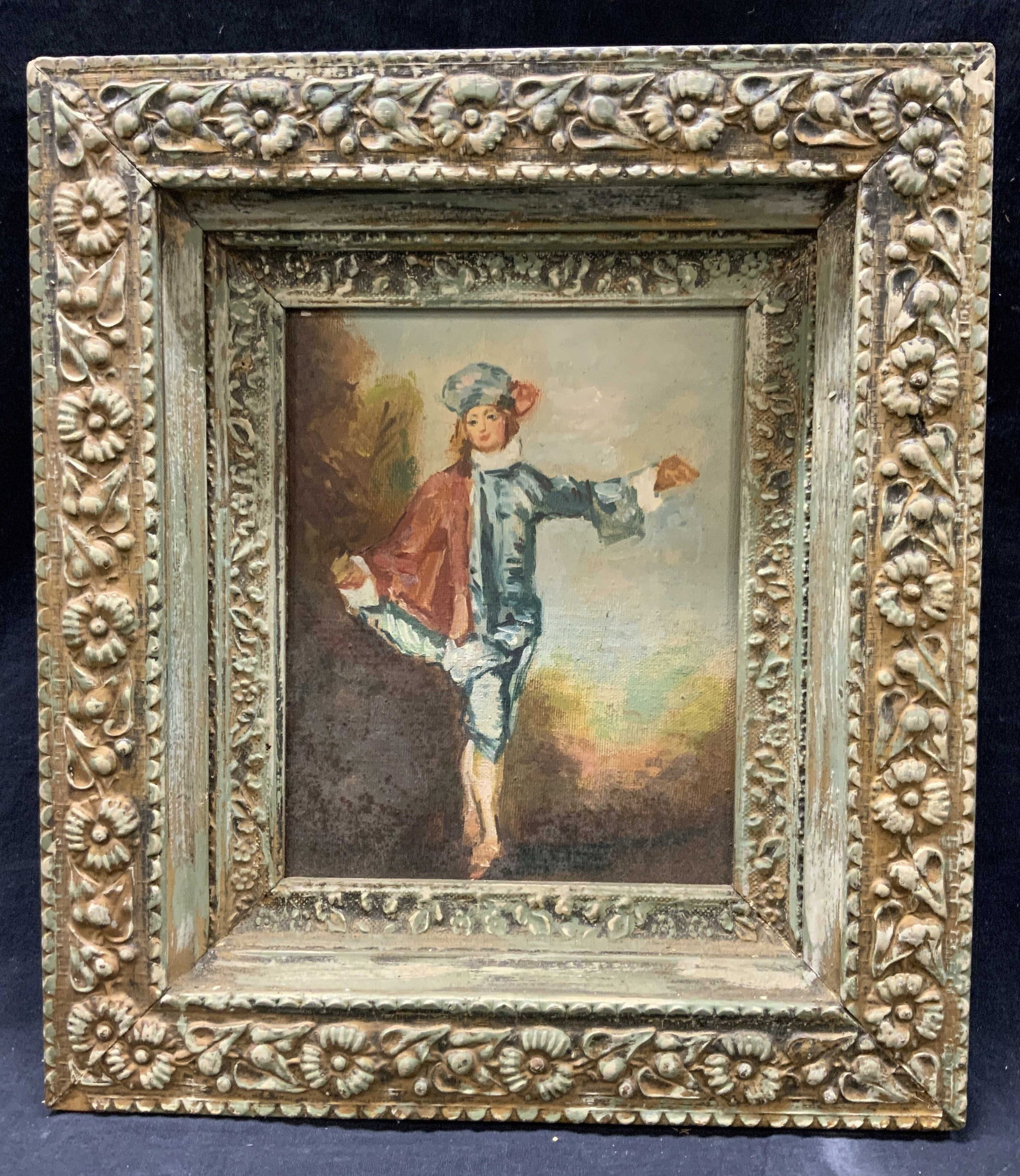 Framed Oil Painting Reproduction L? indefferent: Oil painting on canvas. Antique Reproduction of Jean-Antoine Watteau?s L?indefferent. Framed in ornate wooden frame. Remnants of gilt on inner frame corners. Frame measures approx.14.5 W x 16.75 H in.