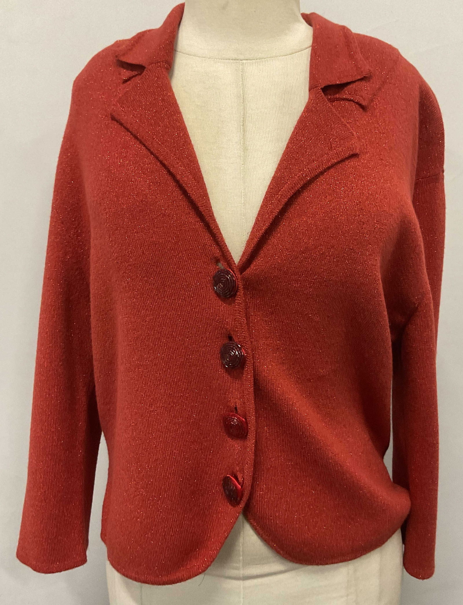 Minuet Red Metallic Cardigan Sweater: Minuet red metallic thread button up cardigan. Size 40. Viscose blend. Some wear to material consistent with exposure. Minuet, minuet cardigan, ladies designer cardigan, ladies designer fashion, ladie