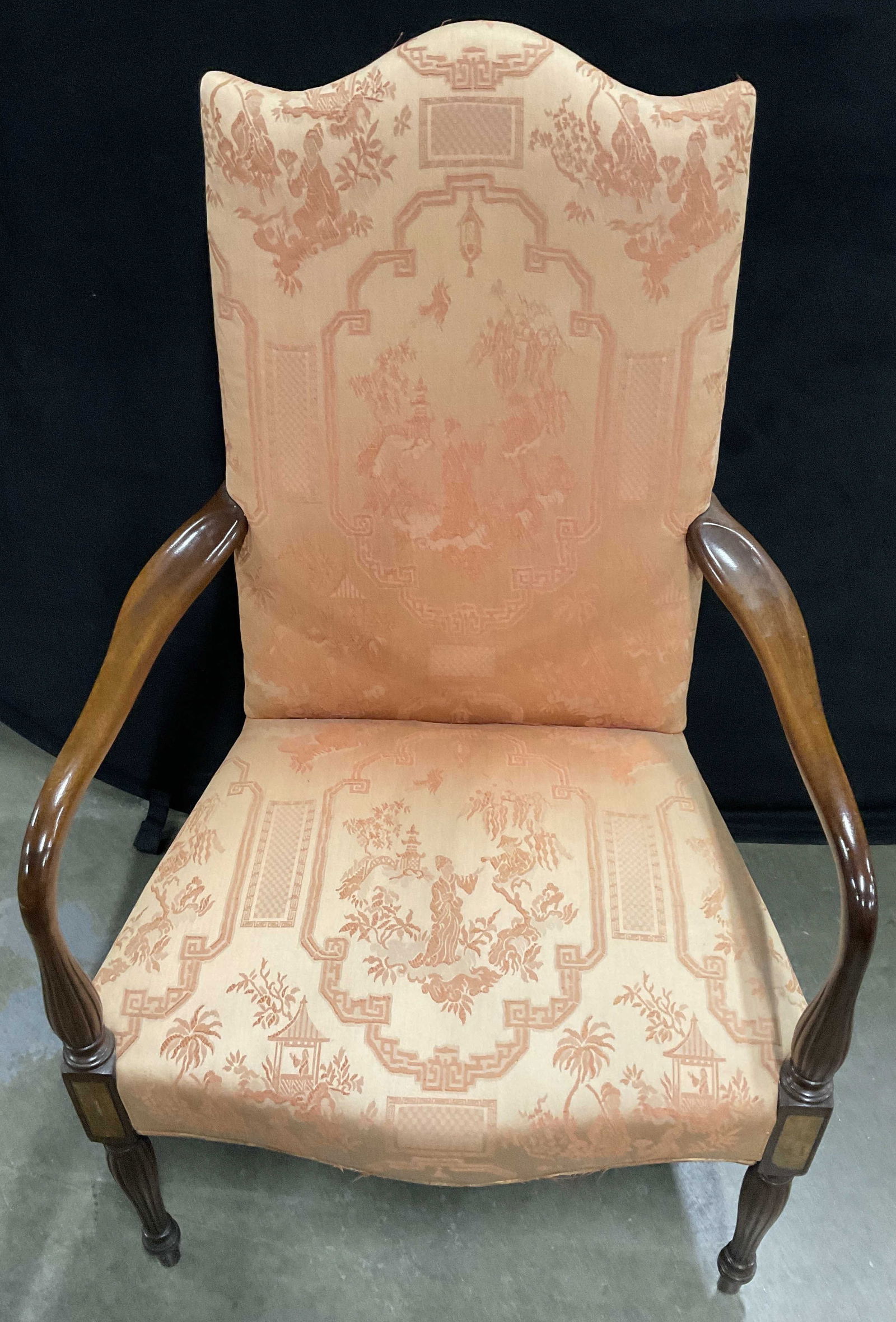HICKORY CHAIR Federal Style Upholstered Armchair: A vintage armchair featuring a wooden Federal style frame and a chinoiserie motif light orange-pink hued upholstery. The upholstery features Asian Figurals and motifs throughout. Inlaid woodwork detai