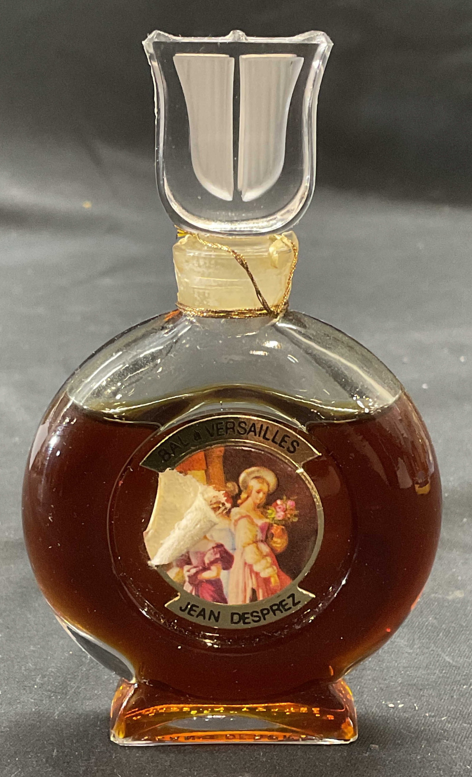 Bal A Versailles Jean Desprez French Perfume: Bal A Versailles by Jean Desprez perfume. Glass bottle. 1 ounce size. Made in France. Measures approx. 2.5 x .5 x 4.25 inches. As Is condition, please review photographs. Jean Desprez, Jean Desprez pe