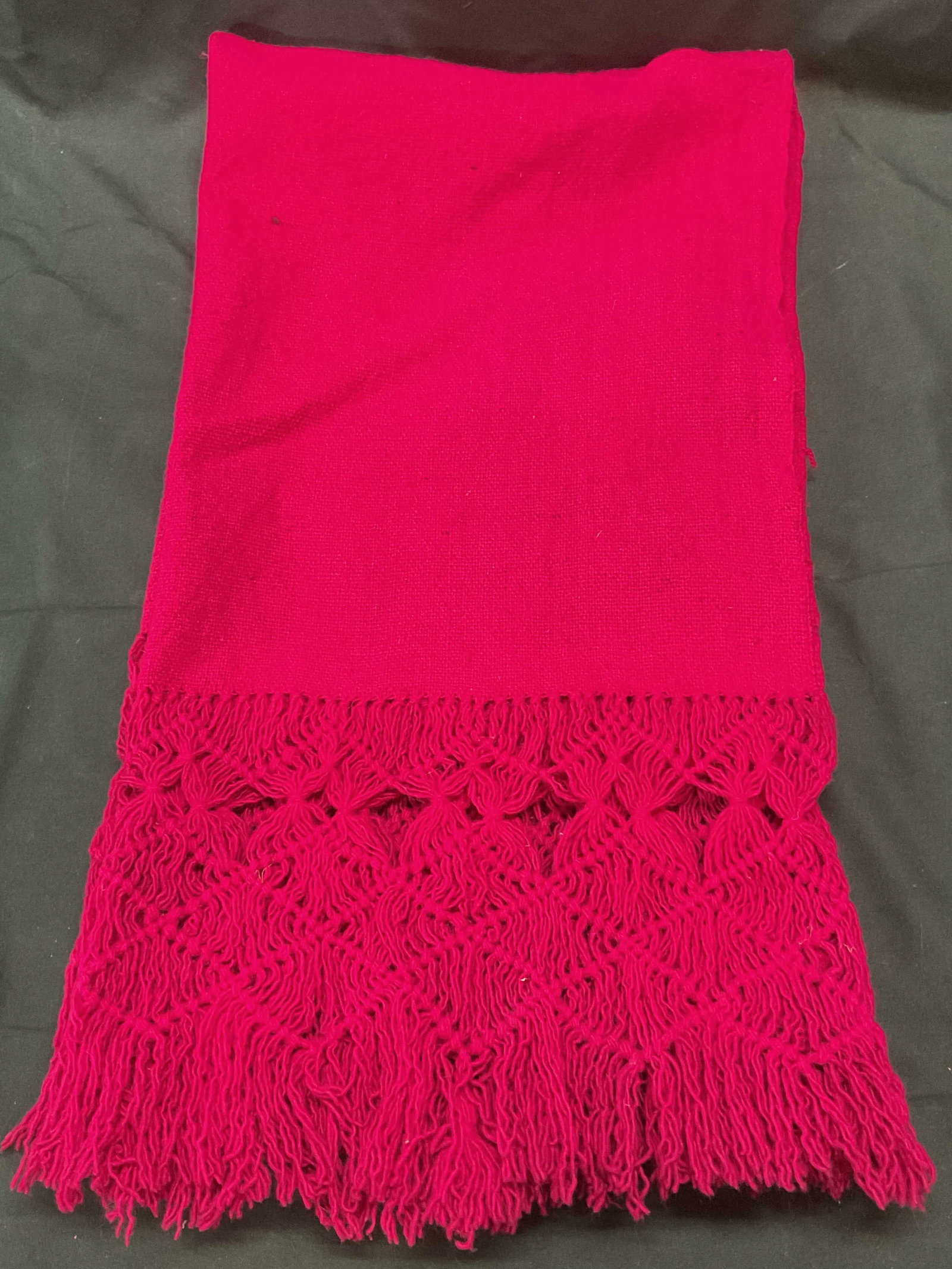 Pink Wool Knit Fringe Scarf: Pink knit scarf with fringe trim. Material feels like wool. Measures approx. 80 inches long. Some wear to material including pilling observed. Ladies scarf, ladies pink scarf, ladies fringe scarf, lad