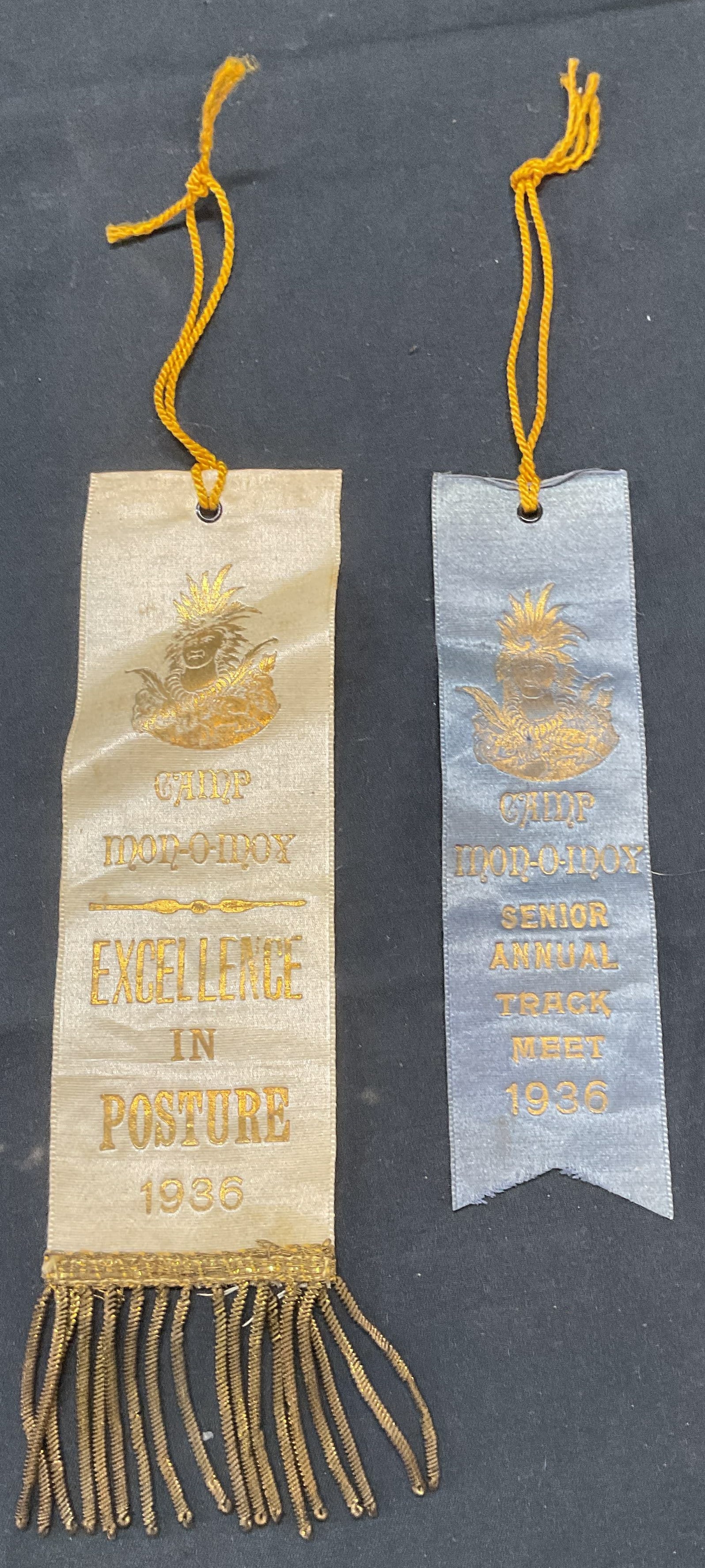Lot 2 1936 Camp Mon O Moy Track Ribbon +: Lot of 2 vintage 1936 camp Mon O Moy ribbons for excellence in posture and senior track meet. Fabric. Made by Fuller Regalia and Costume Co. Larger ribbon measures approx. 8 inches long. Both pieces h